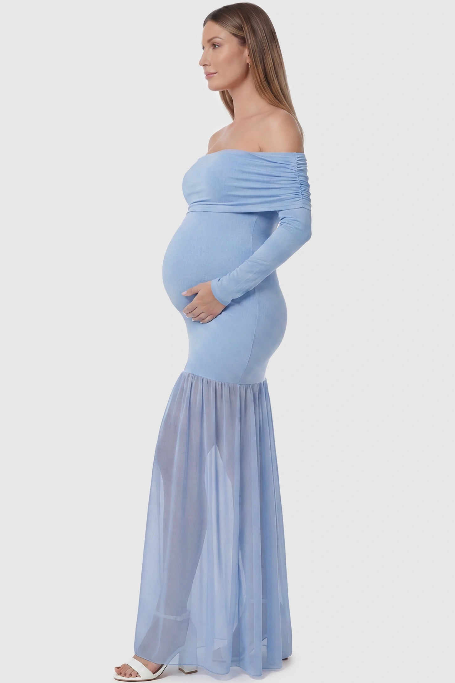 Off-Shoulder Side Ruched Mermaid Maternity Maxi Dress Off-shoulder side ruched mermaid maternity maxi dress in blue with ruched side detailing, side view on pregnant model