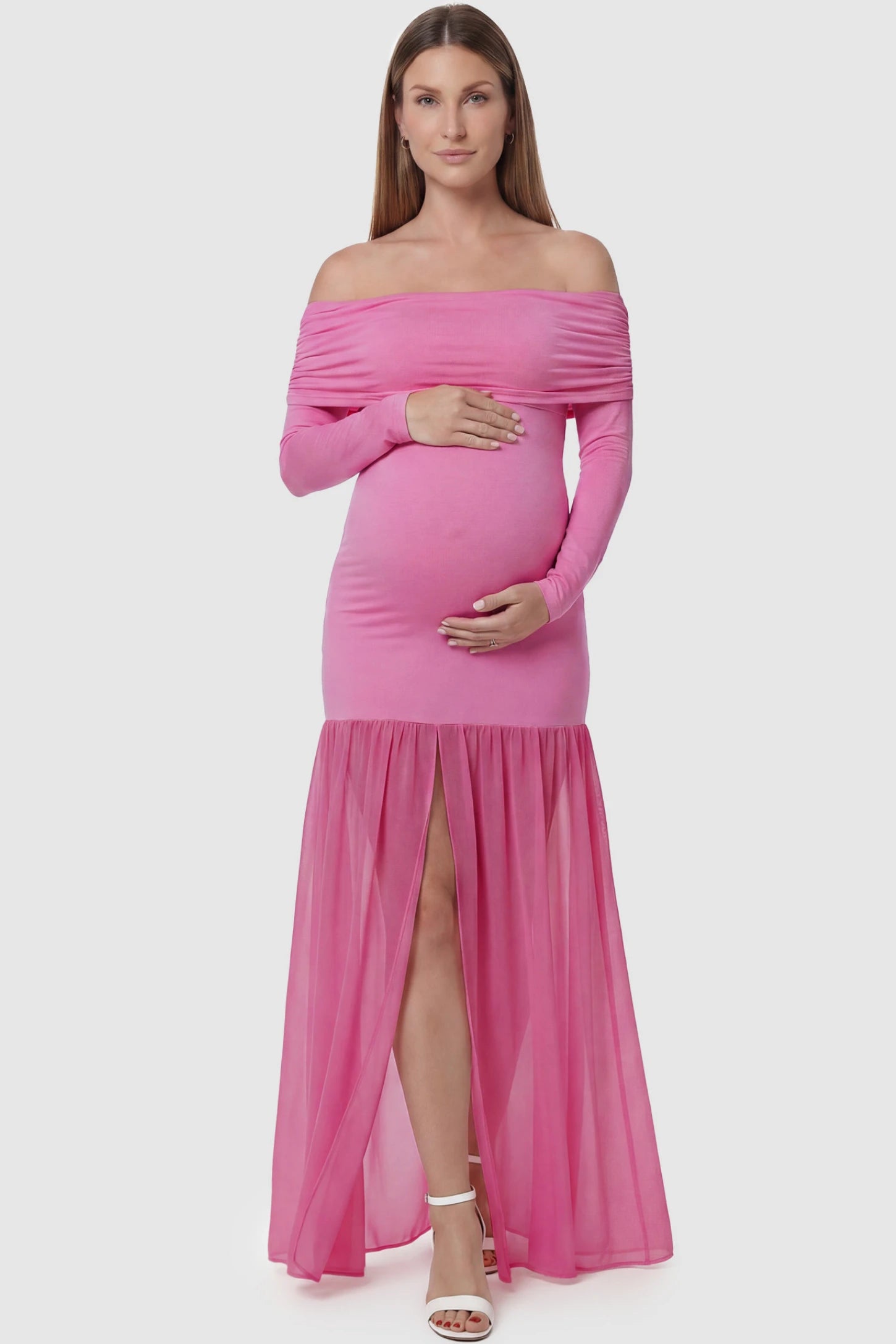 Off-Shoulder Side Ruched Mermaid Maternity Maxi Dress Off-shoulder side ruched mermaid maternity maxi dress in pink with off-shoulder neckline and front slit, front view on pregnant model