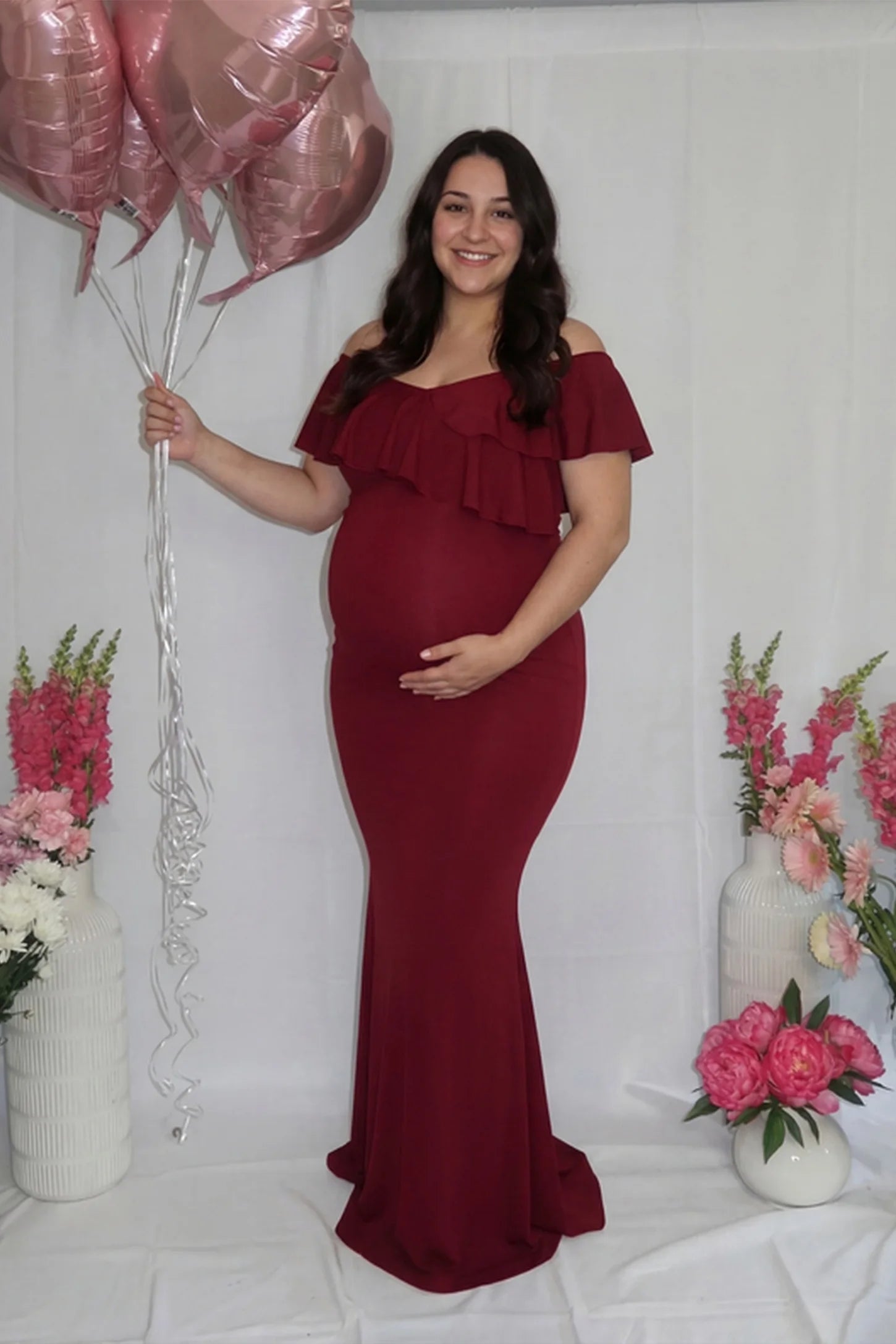 Ruffle Off-Shoulder Slim Fit Maxi Maternity Dress Ruffle off-shoulder slim fit maxi maternity dress in wine red with elegant maternity style, on UGC model