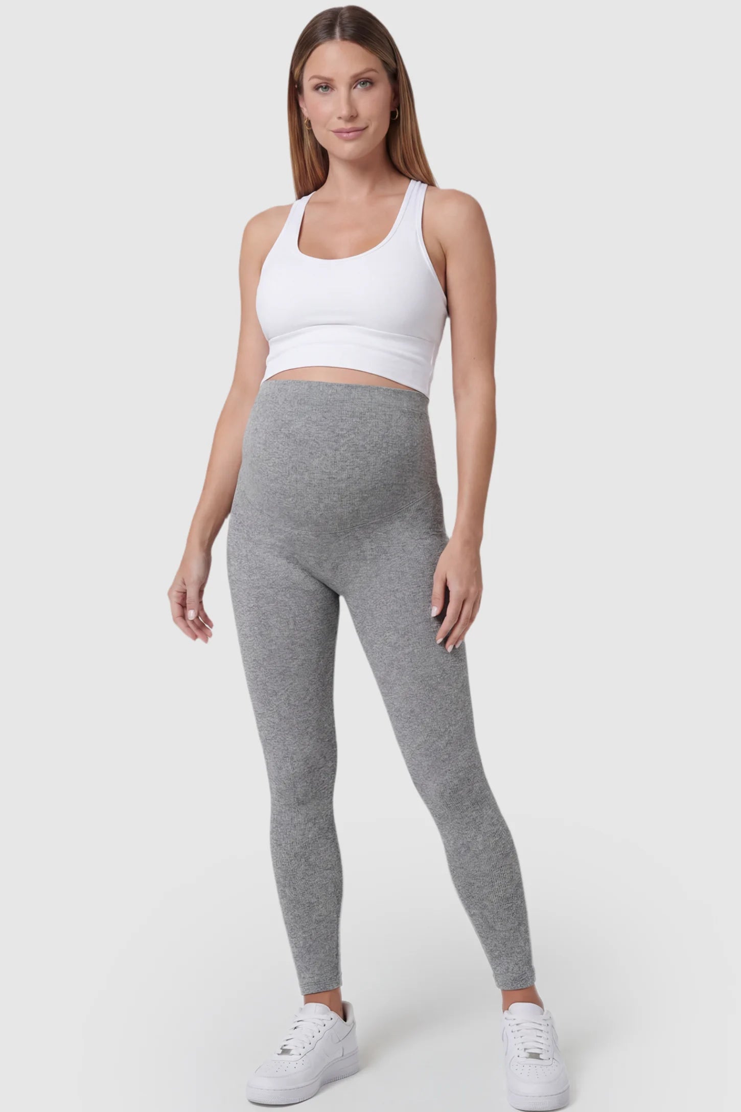 Over-The-Belly Full-Length Maternity Yoga Leggings in gray featuring contouring bodycon fit and supportive full panel on pregnant model.