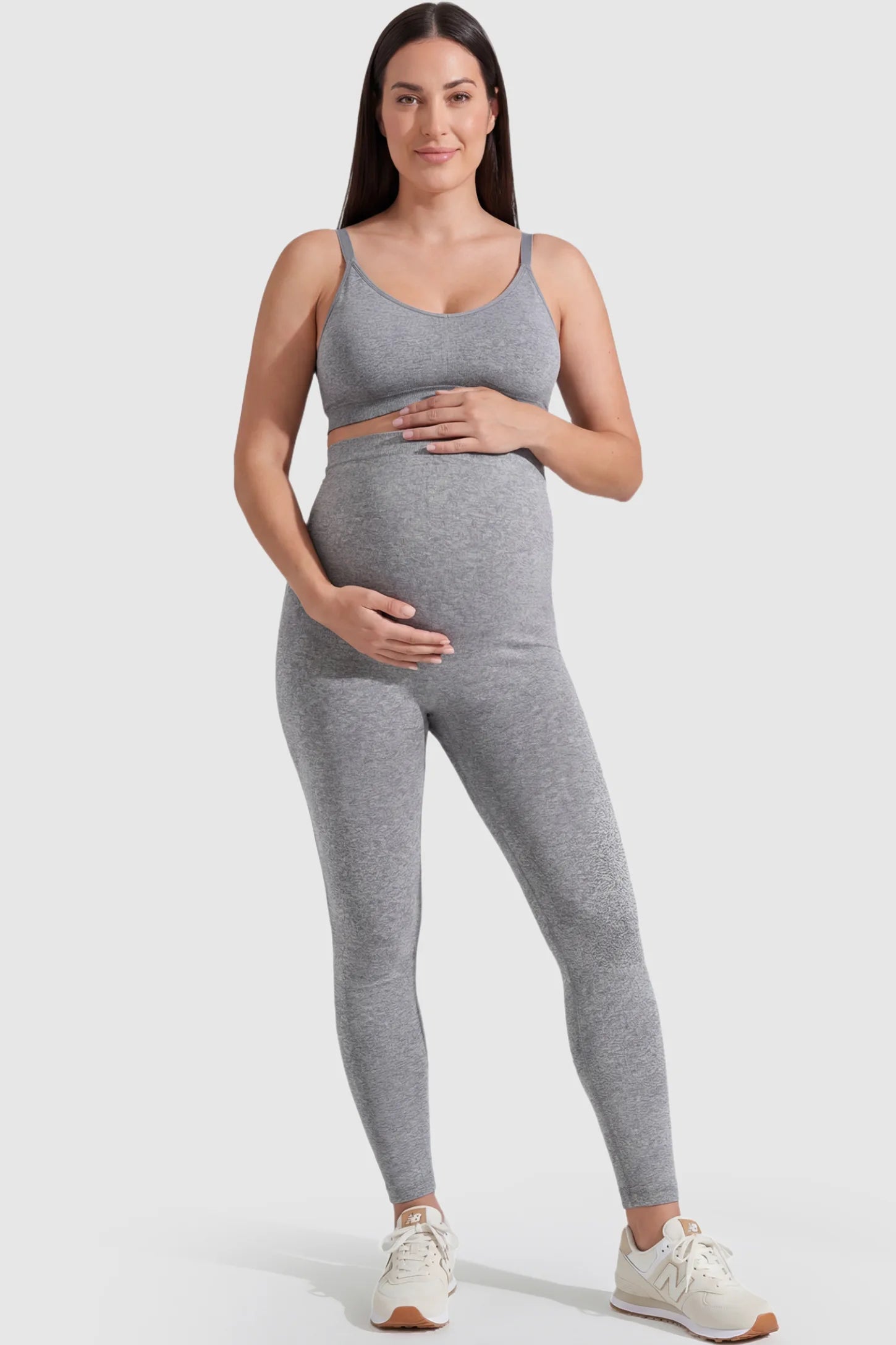 Over-The-Belly Full-Length Maternity Yoga Leggings Over-The-Belly Full-Length Maternity Yoga Leggings in gray featuring contouring bodycon fit and supportive full panel on plus size pregnant model.