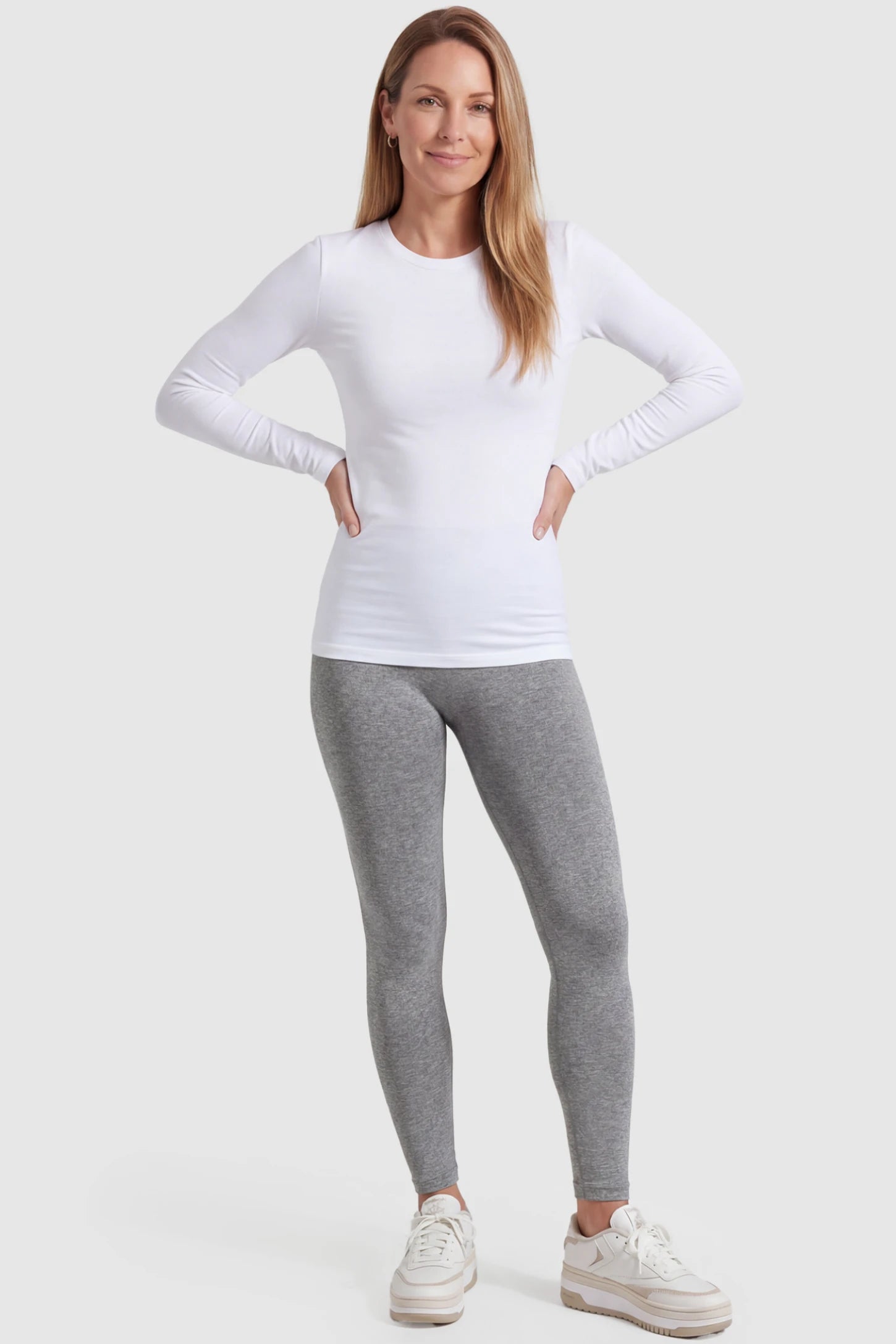 Over-The-Belly Full-Length Maternity Yoga Leggings Over-The-Belly Full-Length Maternity Yoga Leggings in gray featuring contouring bodycon fit and supportive full panel on postpartum model front view.