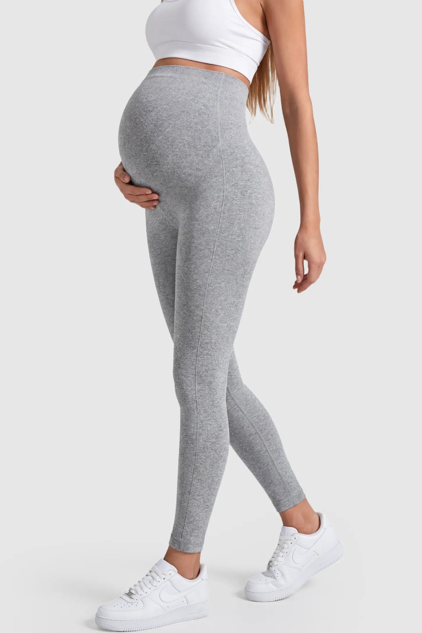 Over-The-Belly Full-Length Maternity Yoga Leggings Over-The-Belly Full-Length Maternity Yoga Leggings in gray featuring contouring bodycon fit and supportive full panel on pregnant model.