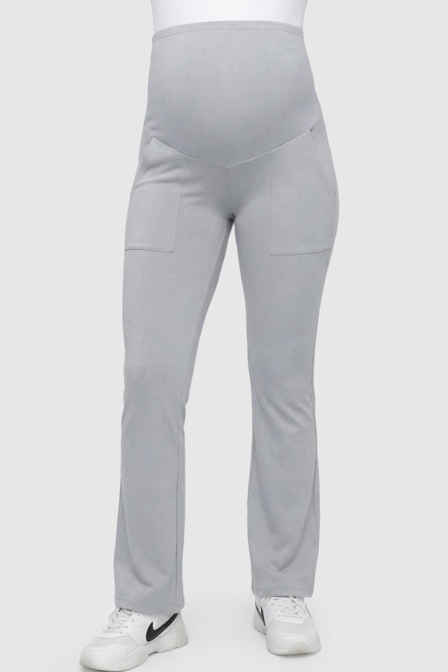 Full Panel Pocketed Flare Leg Maternity Leggings Full Panel Pocketed Flare Leg Maternity Leggings in Gray featuring a ribbed over-the-bump panel on a pregnant model.