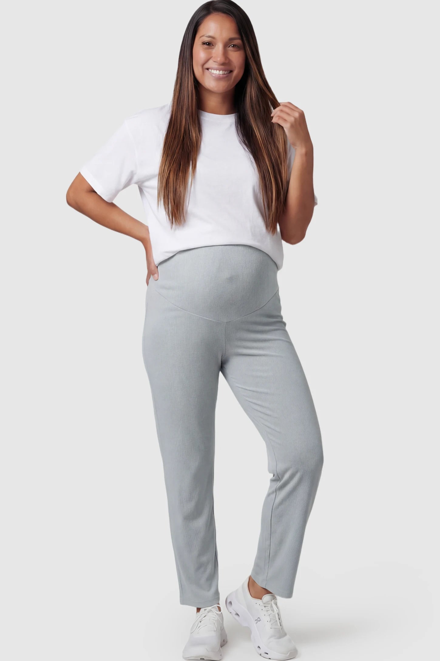 Adjustable Elastic Waist Straight Leg Maternity Pants Straight Leg Maternity Pants in green featuring an adjustable elastic waist on a pregnant model.