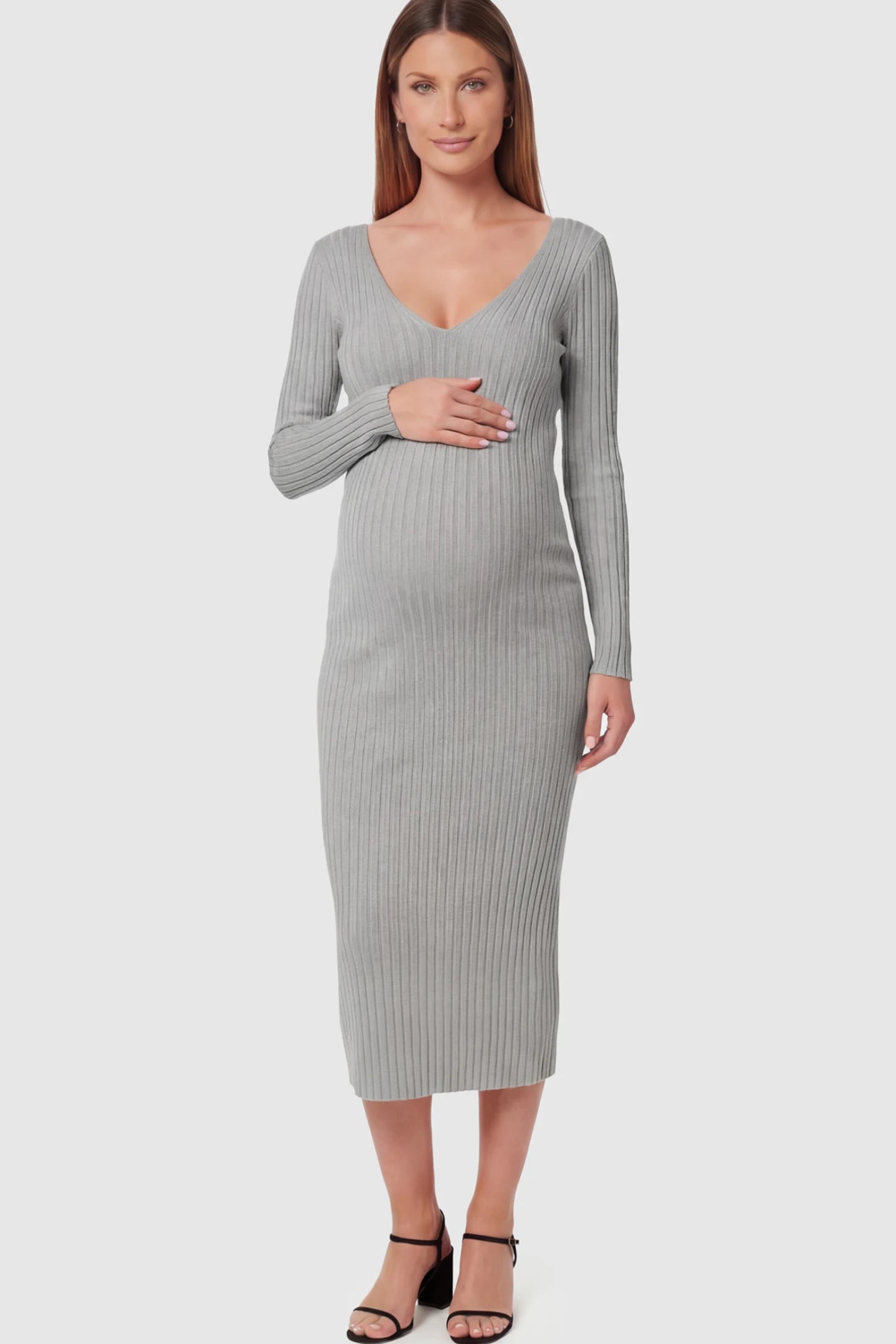 Ribbed V-Neck Long Sleeve Maternity Midi Dress Ribbed V-Neck Maternity Midi Dress in Gray featuring a fitted long sleeve on a pregnant model.