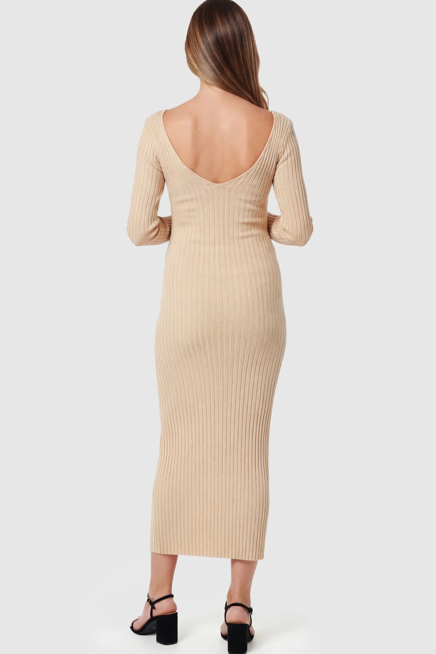 Ribbed V-Neck Long Sleeve Maternity Midi Dress Ribbed V-Neck Maternity Midi Dress in Khaki featuring a fitted long sleeve on a pregnant model.