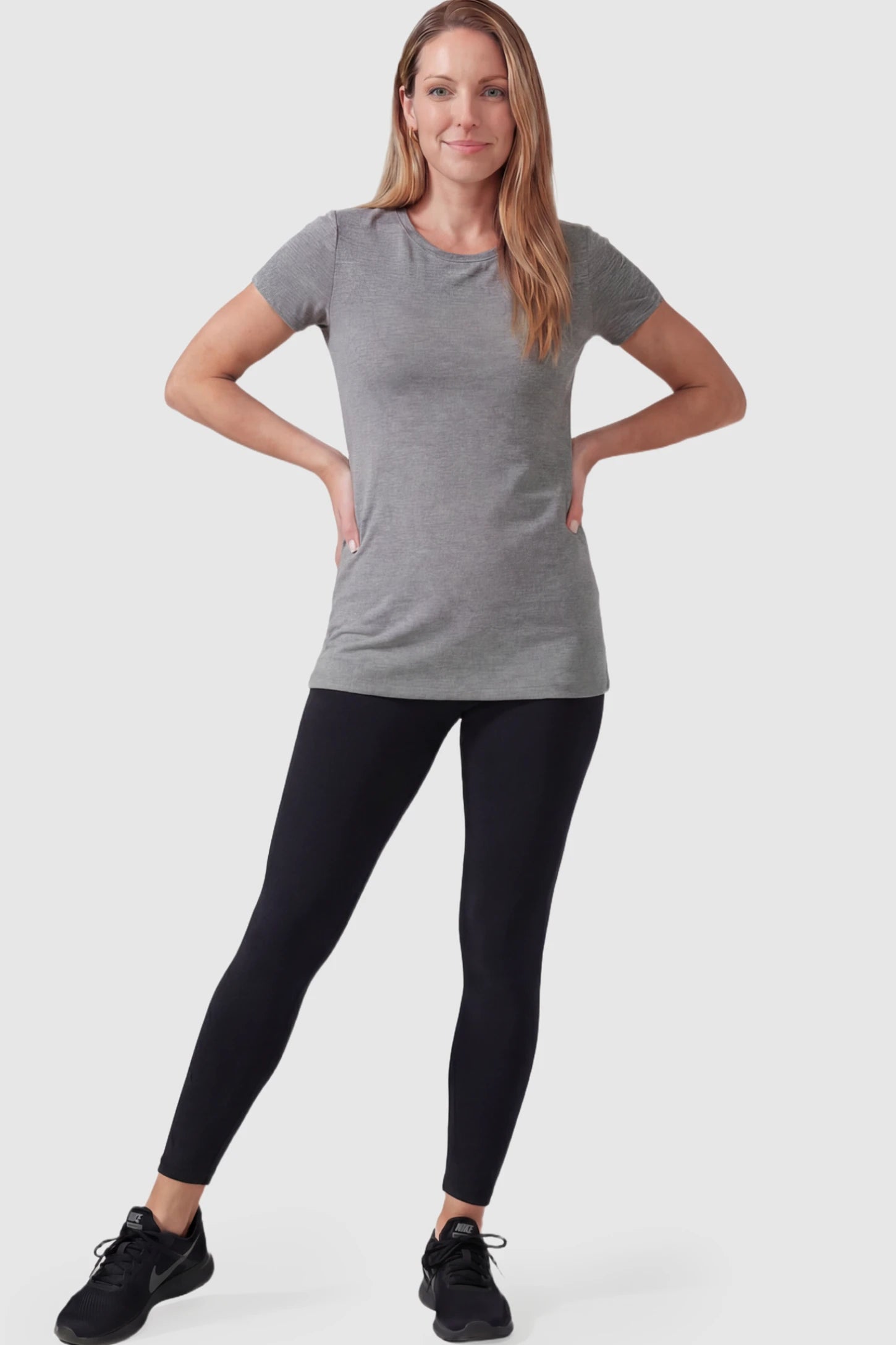 Full Panel Slim Fit Maternity Leggings Full Panel Slim Fit Maternity Leggings in Black featuring a seamless over-the-belly waistband on a postpartum model facing front.