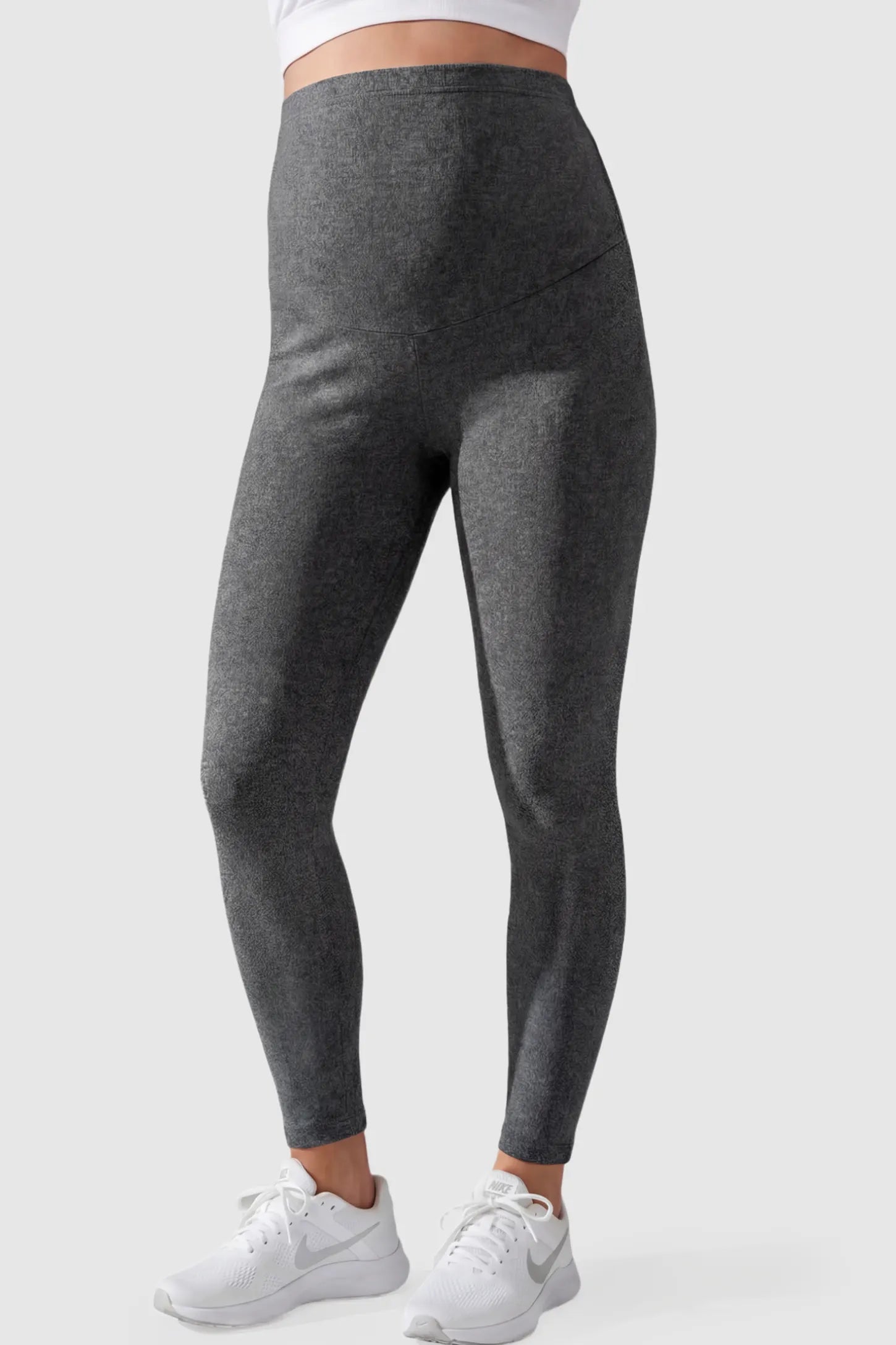 Full Panel Slim Fit Maternity Leggings in Dark Gray featuring a seamless over-the-belly waistband on a pregnant model showing front.