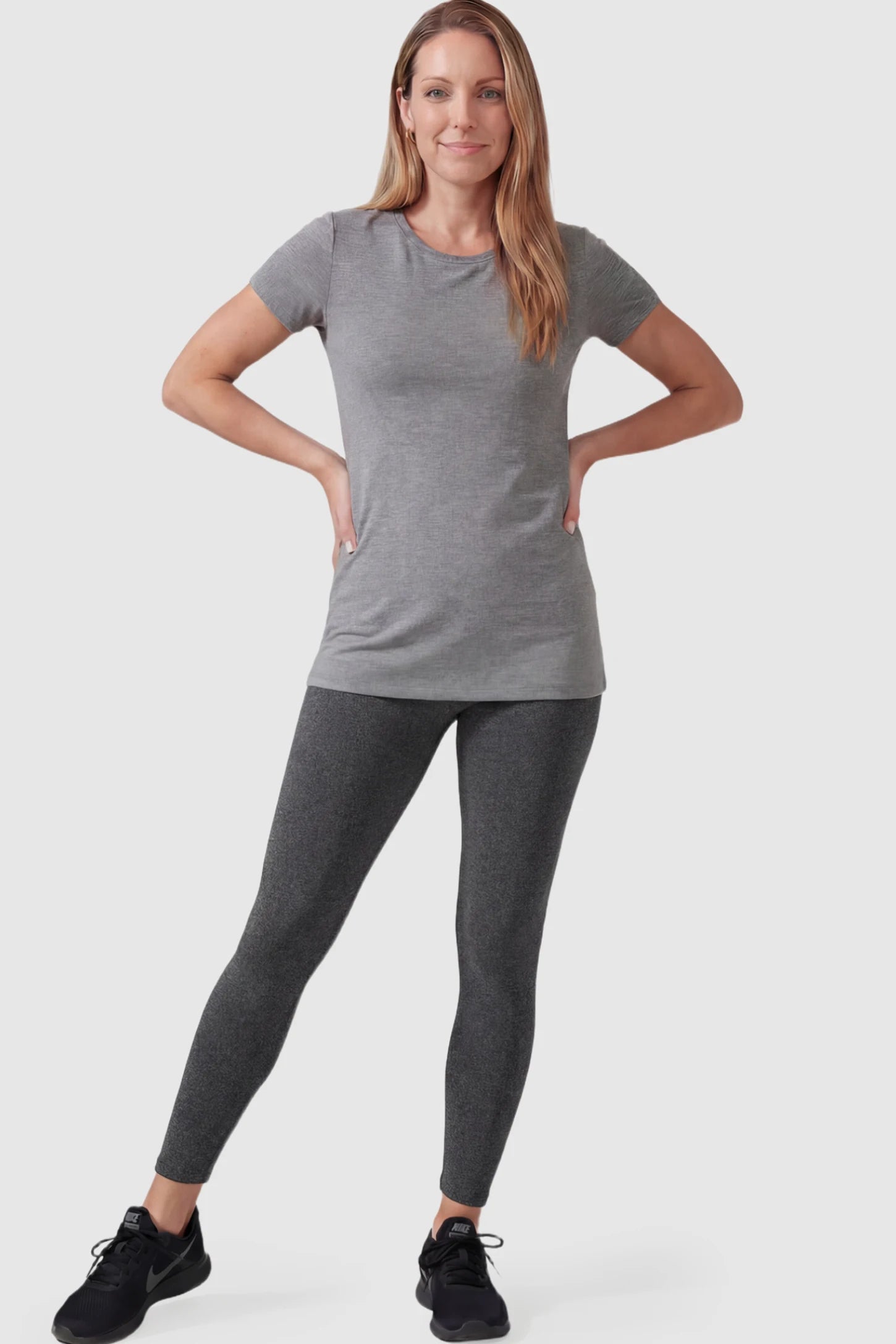 Full Panel Slim Fit Maternity Leggings Full Panel Slim Fit Maternity Leggings in Dark Gray featuring a seamless over-the-belly waistband on a postpartum model facing front.