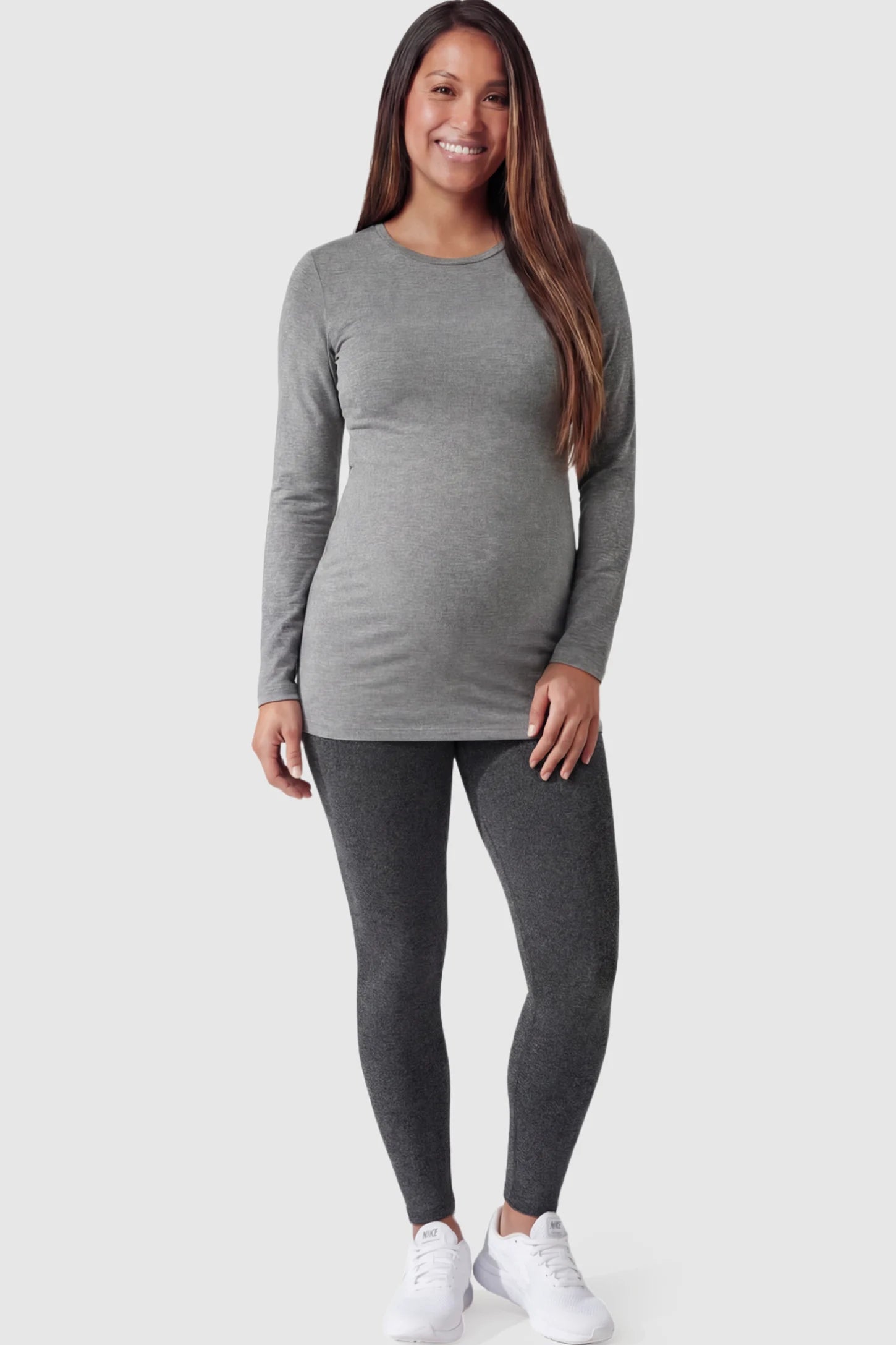 Full Panel Slim Fit Maternity Leggings in Dark Gray featuring a seamless over-the-belly waistband on a pregnant model facing front.