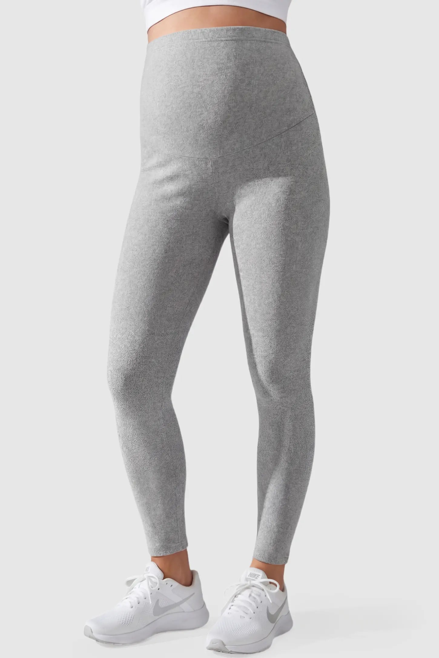 Full Panel Slim Fit Maternity Leggings Full Panel Slim Fit Maternity Leggings in Light Gray featuring a seamless over-the-belly waistband on a pregnant model showing front.