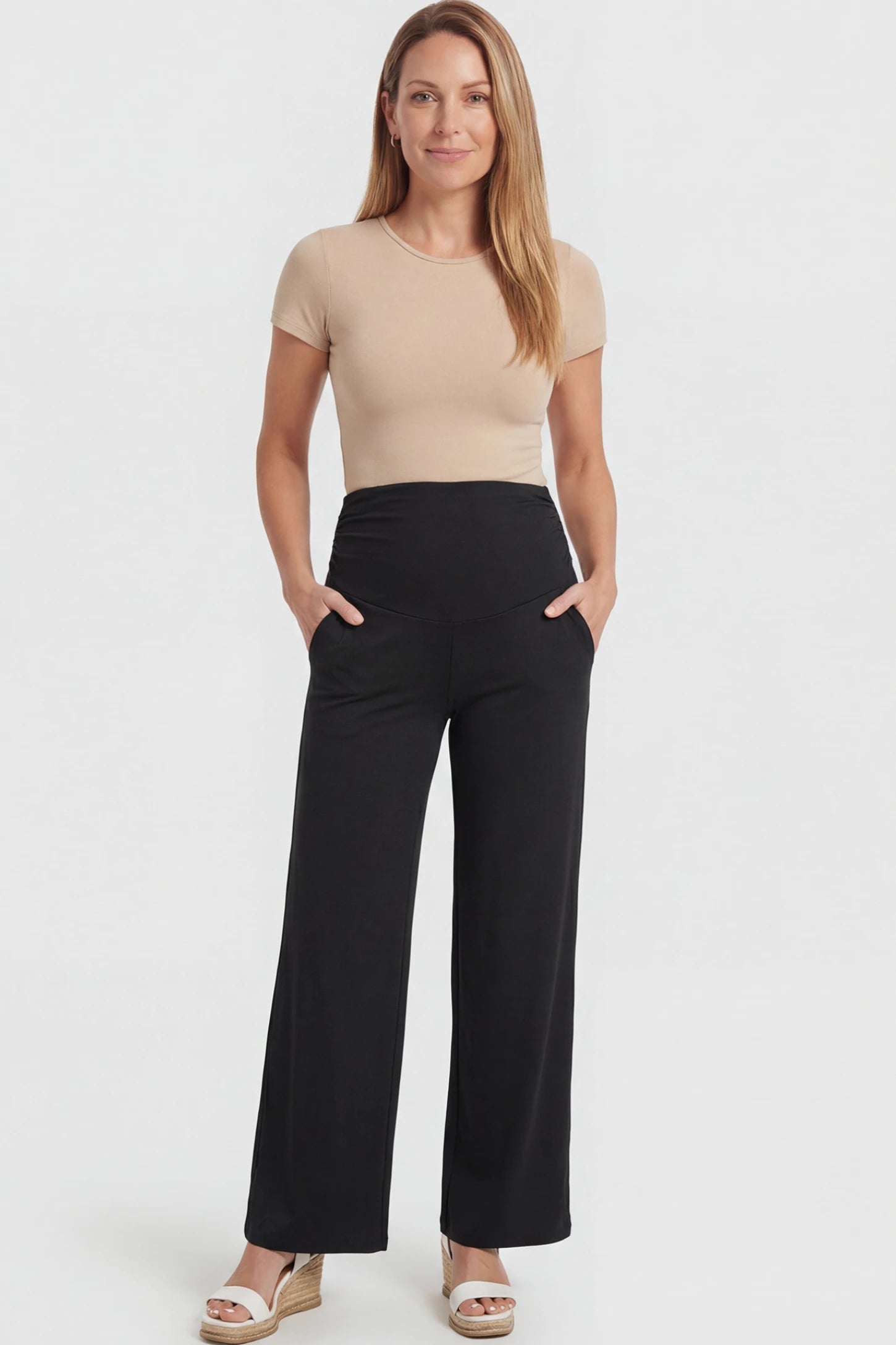 Ruched Full Panel Wide Leg Maternity Pants Ruched Full Panel Wide-Leg Maternity Pants in Black featuring side pockets on a postpartum model.