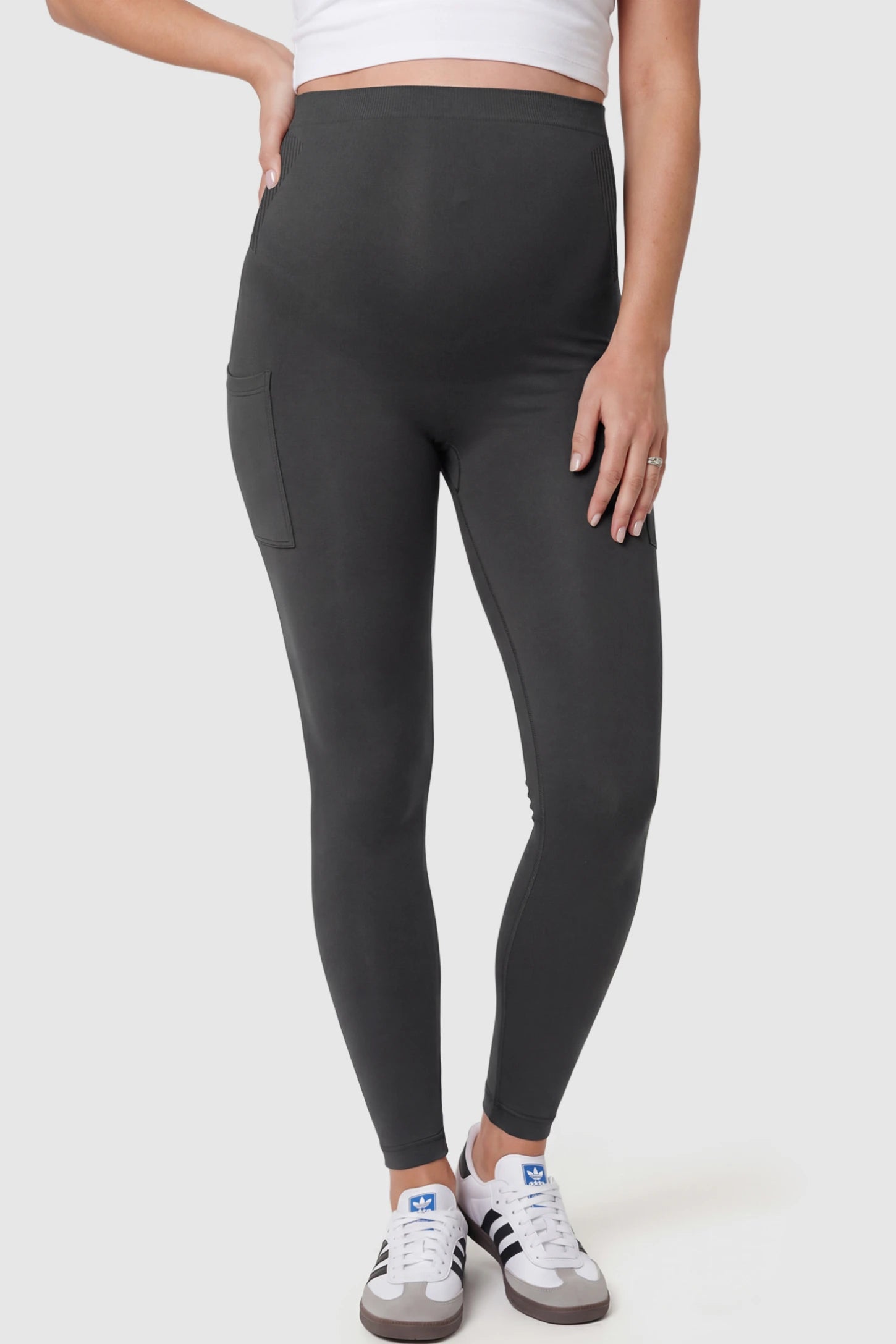High Waist Ankle Length Pocketed Maternity Leggings High-Waist Ankle-Length Pocketed Maternity Leggings in Gray featuring a seamless waistband on a pregnant model.