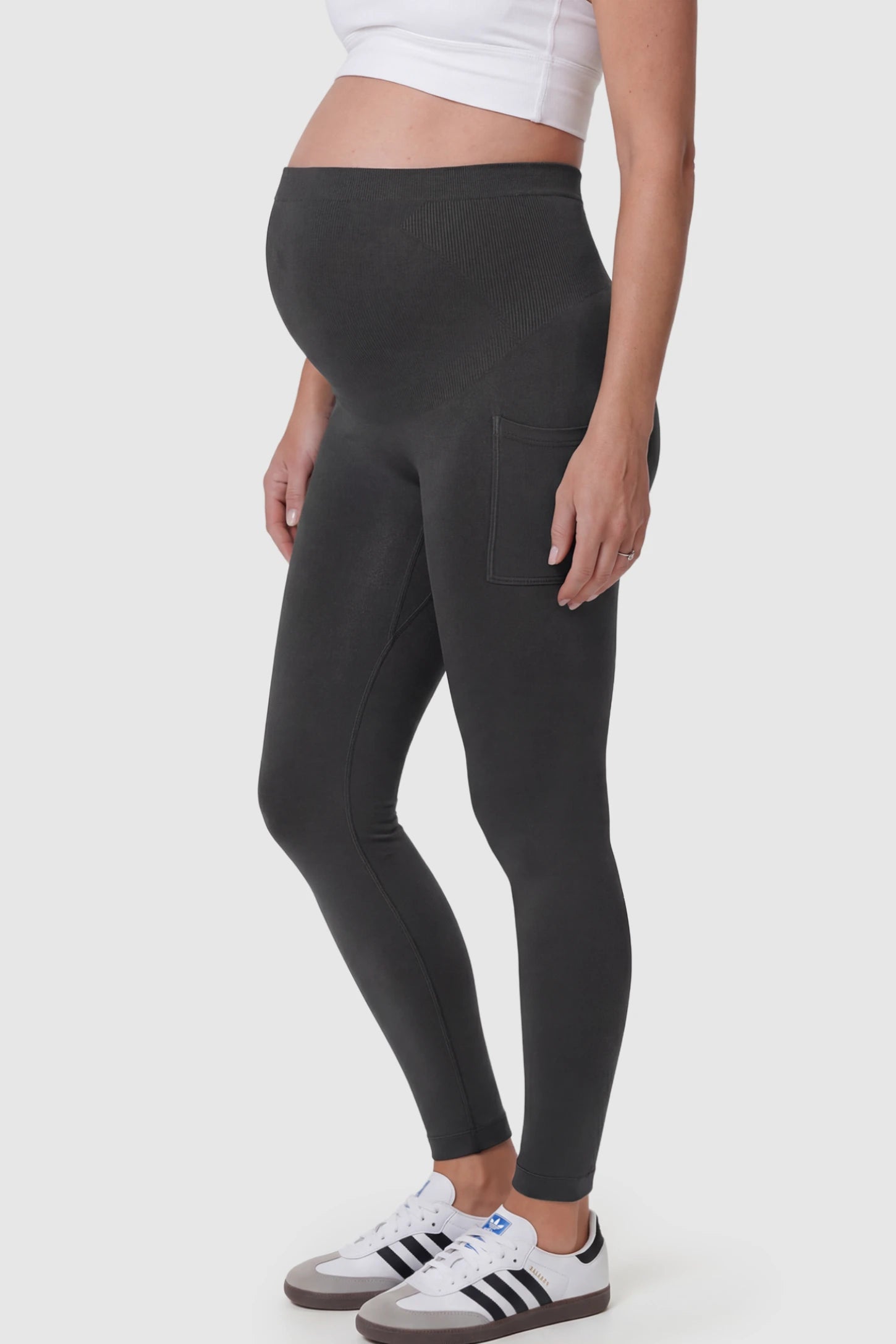 High Waist Ankle Length Pocketed Maternity Leggings High-Waist Ankle-Length Pocketed Maternity Leggings in Gray featuring a seamless waistband on a pregnant model.