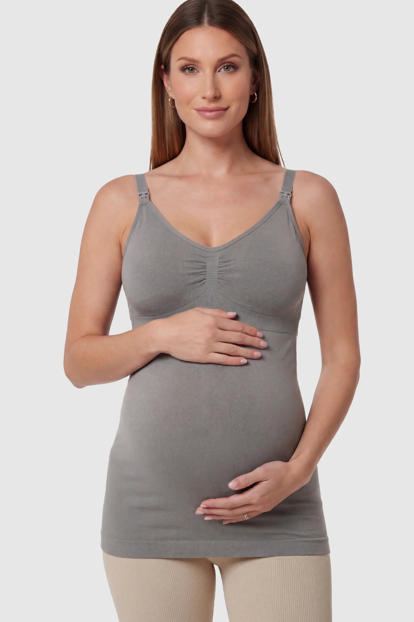 Solid Seamless Maternity & Nursing Camisole Solid Seamless Maternity & Nursing Camisole in Gray featuring one-handed nursing clips on a pregnant model.