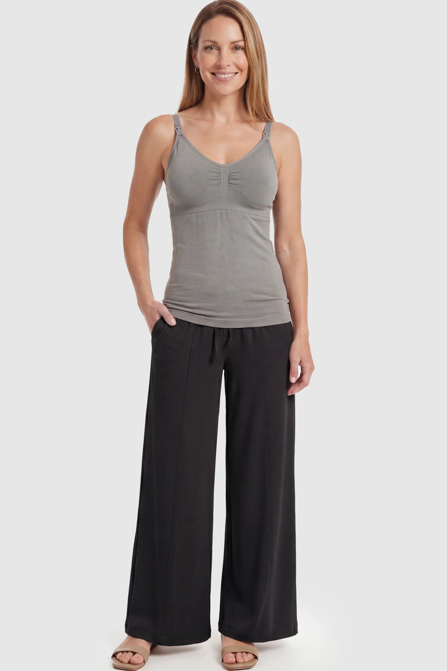 Solid Seamless Maternity & Nursing Camisole Solid Seamless Maternity & Nursing Camisole in Gray featuring one-handed nursing clips on a postpartum model.