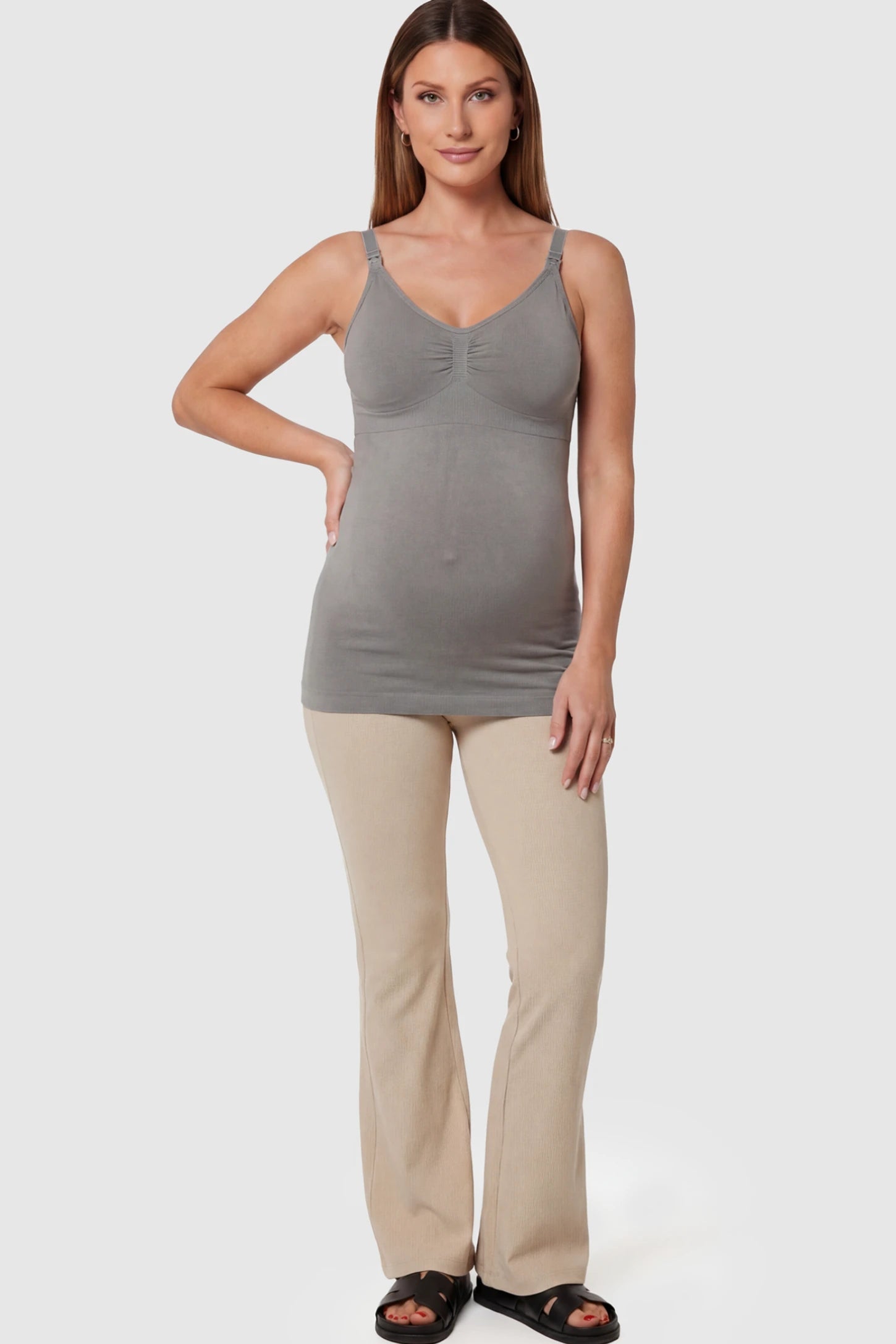 Solid Seamless Maternity & Nursing Camisole Solid Seamless Maternity & Nursing Camisole in Gray featuring one-handed nursing clips on a pregnant model.