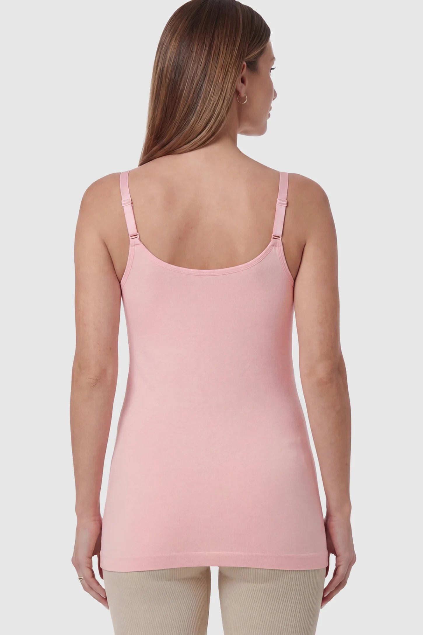 Solid Seamless Maternity & Nursing Camisole Solid Seamless Maternity & Nursing Camisole in Pink on a pregnant model.