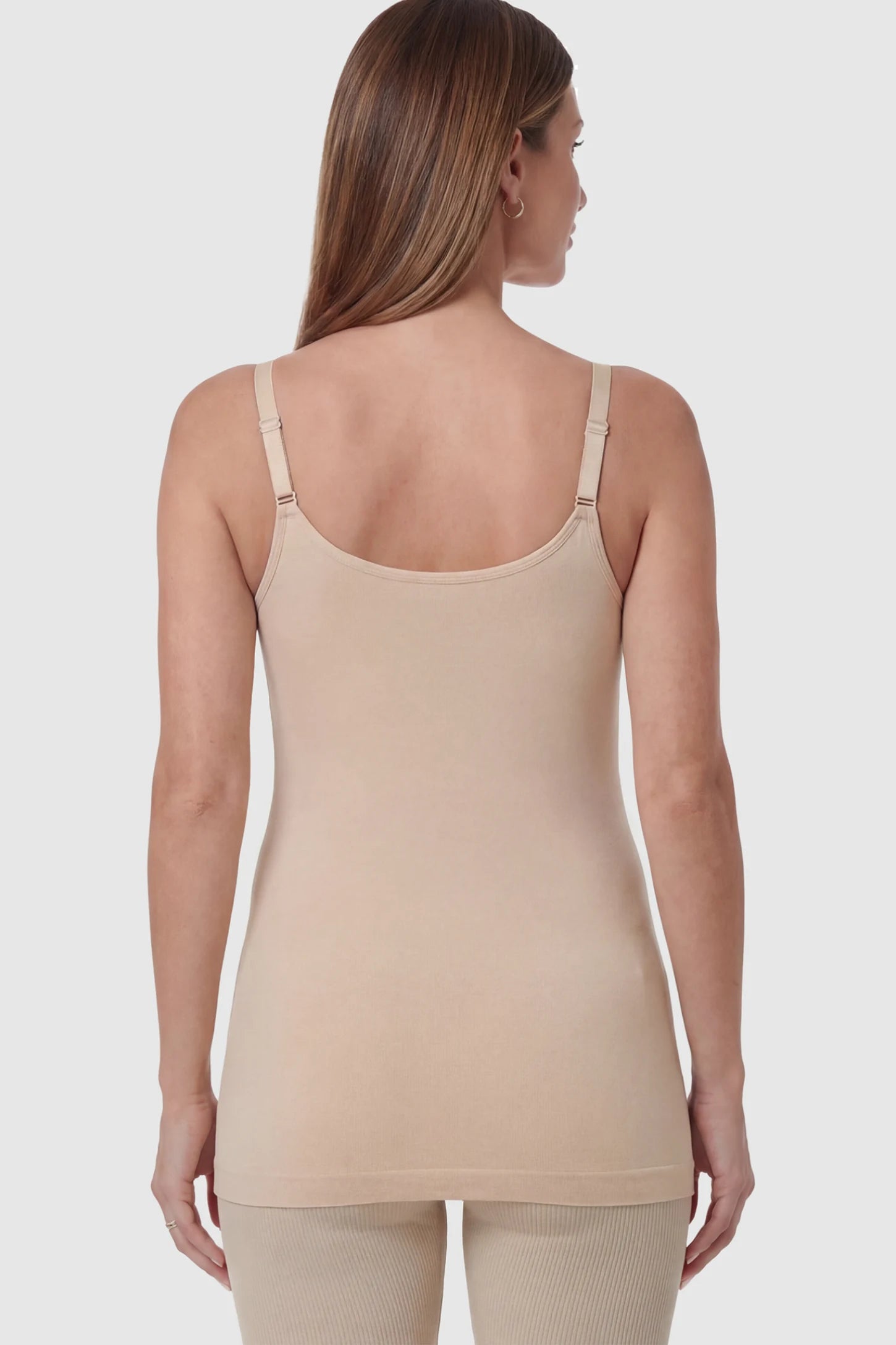 Solid Seamless Maternity & Nursing Camisole Solid Seamless Maternity & Nursing Camisole in Skin on a pregnant model.