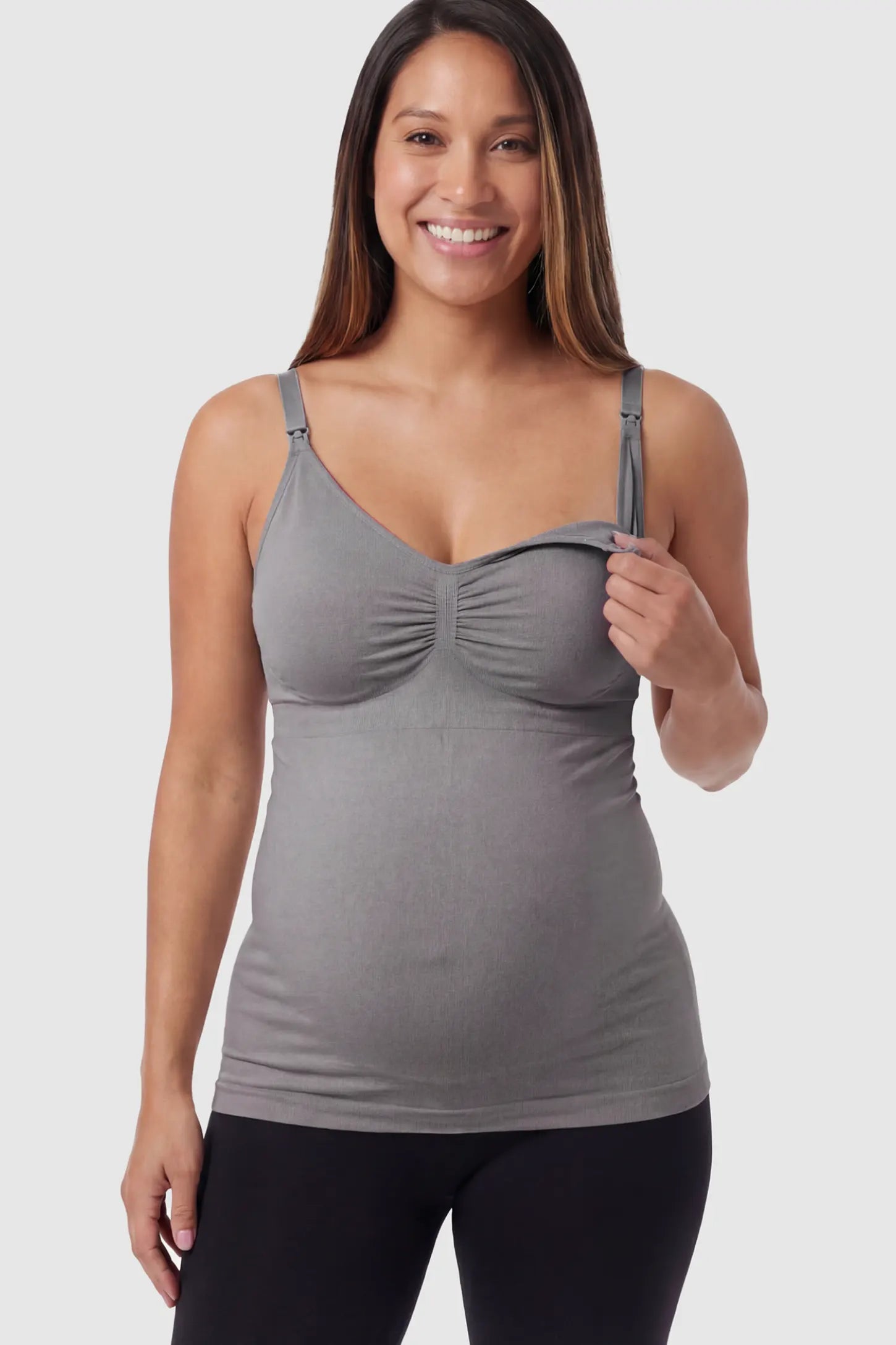 Solid Seamless Maternity & Nursing Camisole Solid Seamless Maternity & Nursing Camisole in Baili Gray featuring one-handed nursing clips on a pregnant model.