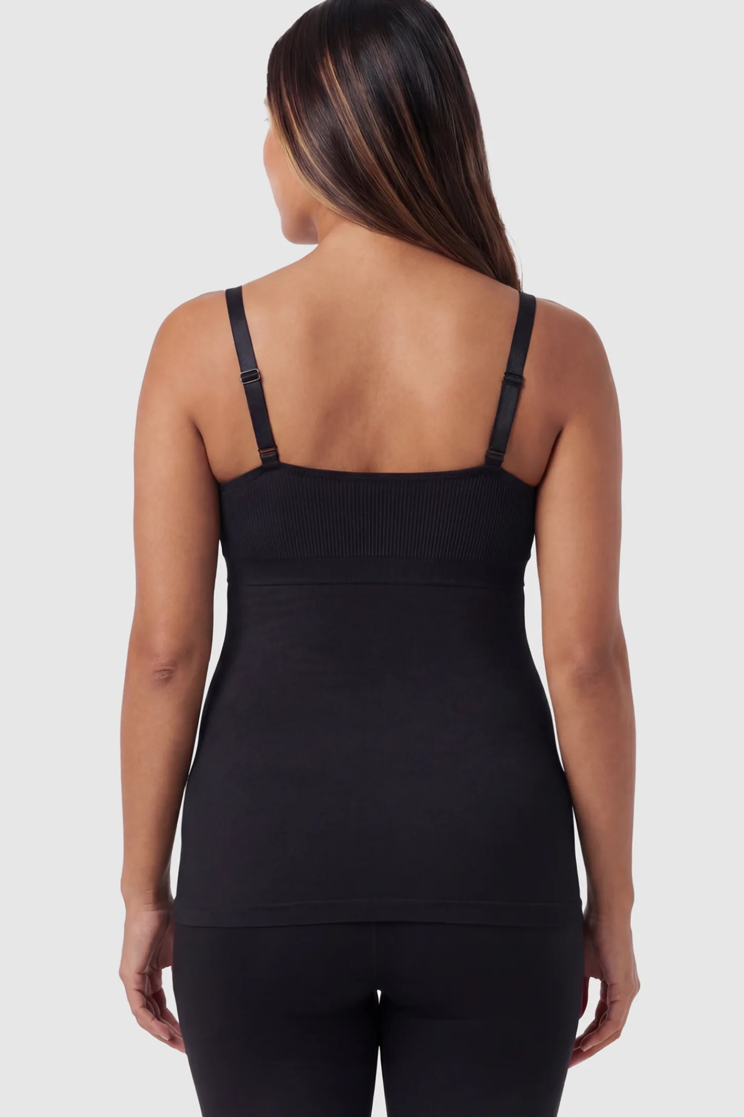 Solid Seamless Maternity & Nursing Camisole Solid Seamless Maternity & Nursing Camisole in Black on a pregnant model.