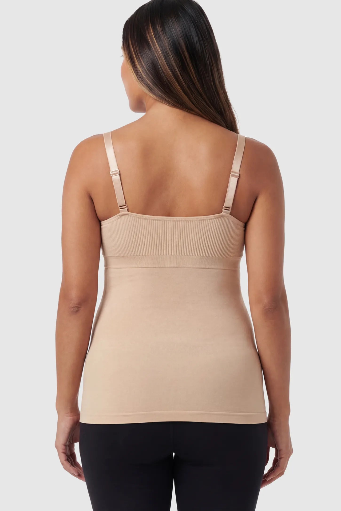 Solid Seamless Maternity & Nursing Camisole Solid Seamless Maternity & Nursing Camisole in Nude on a pregnant model.