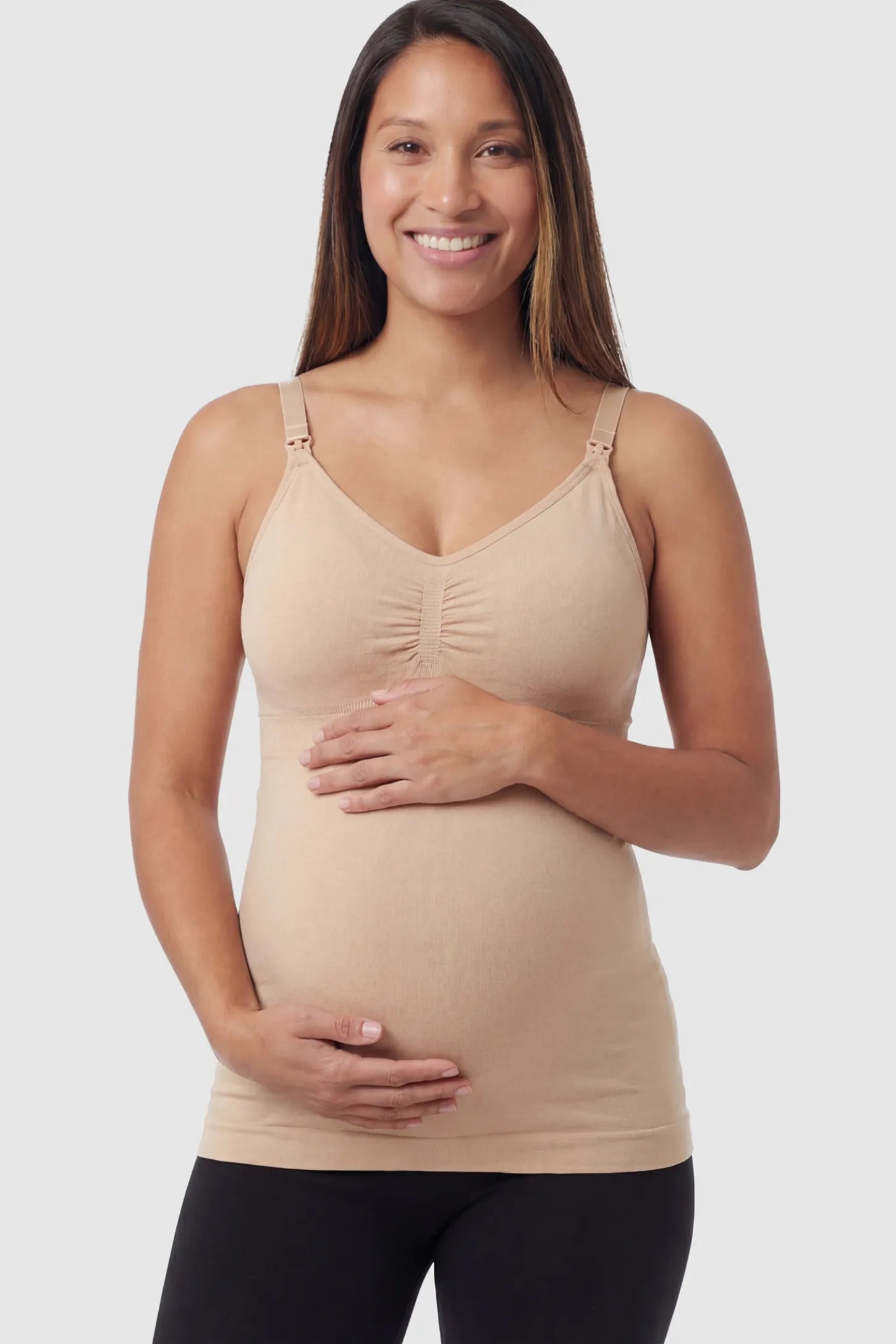 Solid Seamless Maternity & Nursing Camisole in Nude featuring one-handed nursing clips on a pregnant model.