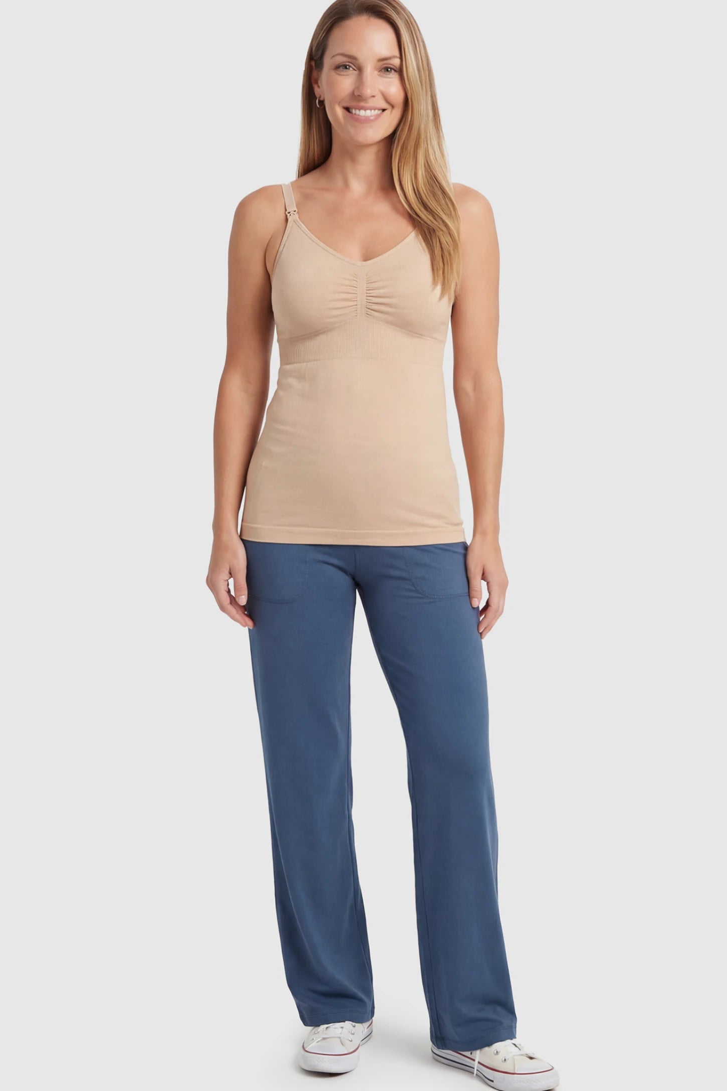 Solid Seamless Maternity & Nursing Camisole Solid Seamless Maternity & Nursing Camisole in Nude featuring one-handed nursing clips on a non pregnant model.