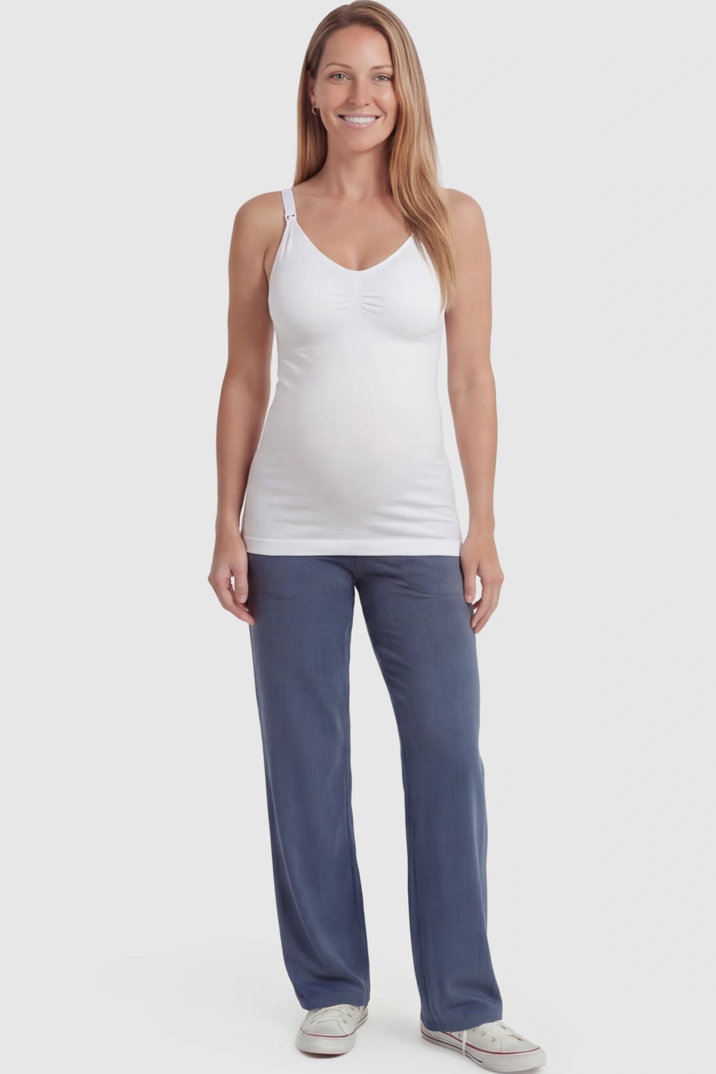 Solid Seamless Maternity & Nursing Camisole Solid Seamless Maternity & Nursing Camisole in White featuring one-handed nursing clips on a postpartum model.