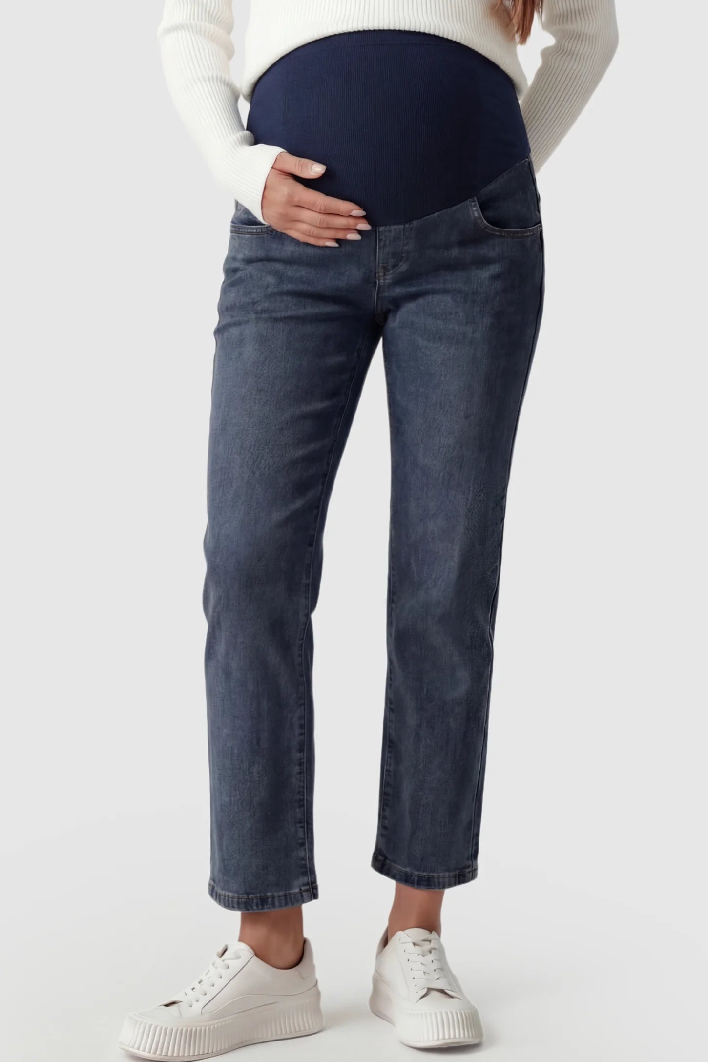 Elastic Full Panel Straight Leg Maternity Jeans Elastic Full Panel Straight Leg Maternity Jeans in Blue Gray featuring a high-stretch jersey waistband on a pregnant model.