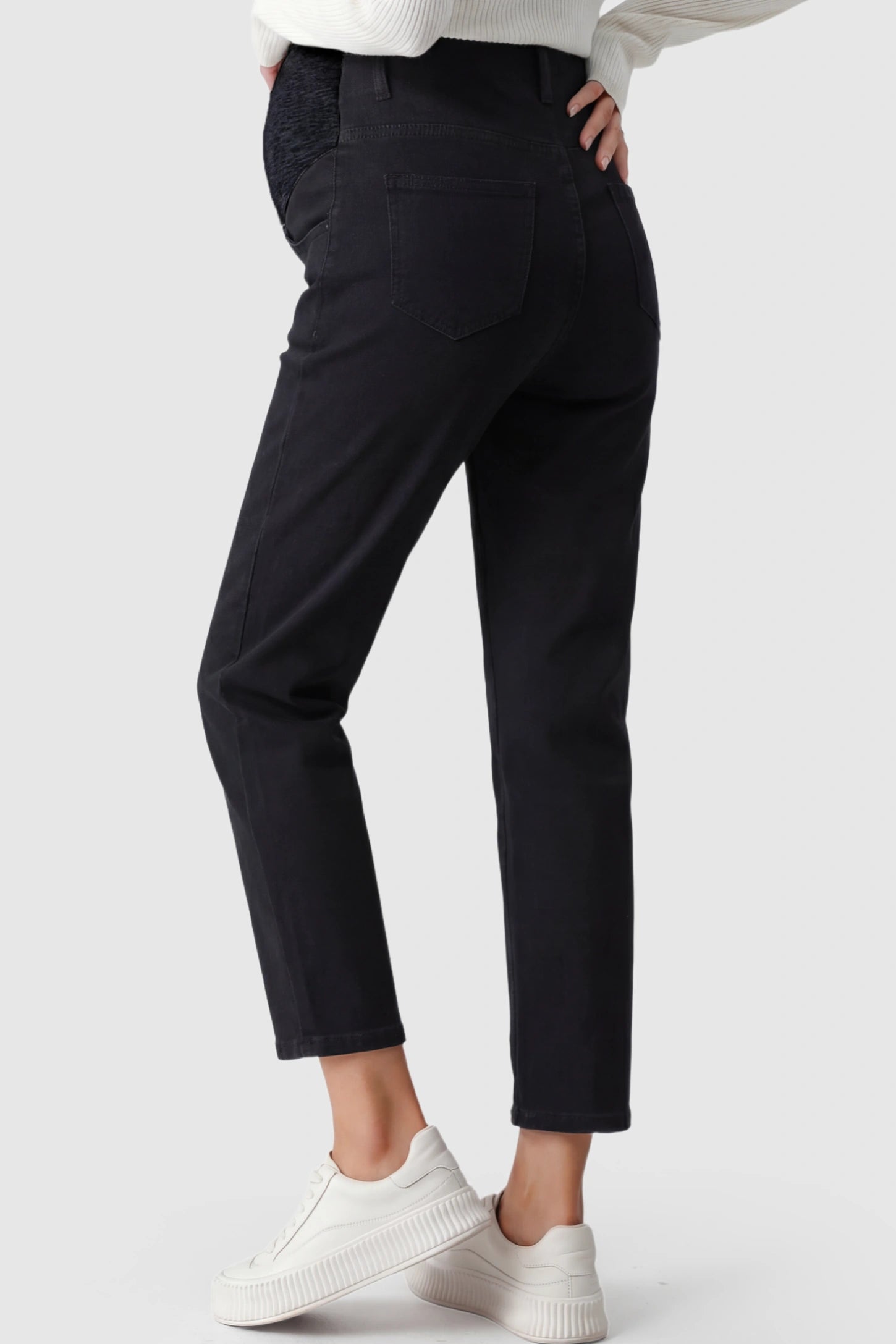 Elastic Full Panel Straight Leg Maternity Jeans Elastic Full Panel Straight Leg Maternity Jeans in Black on a pregnant model.