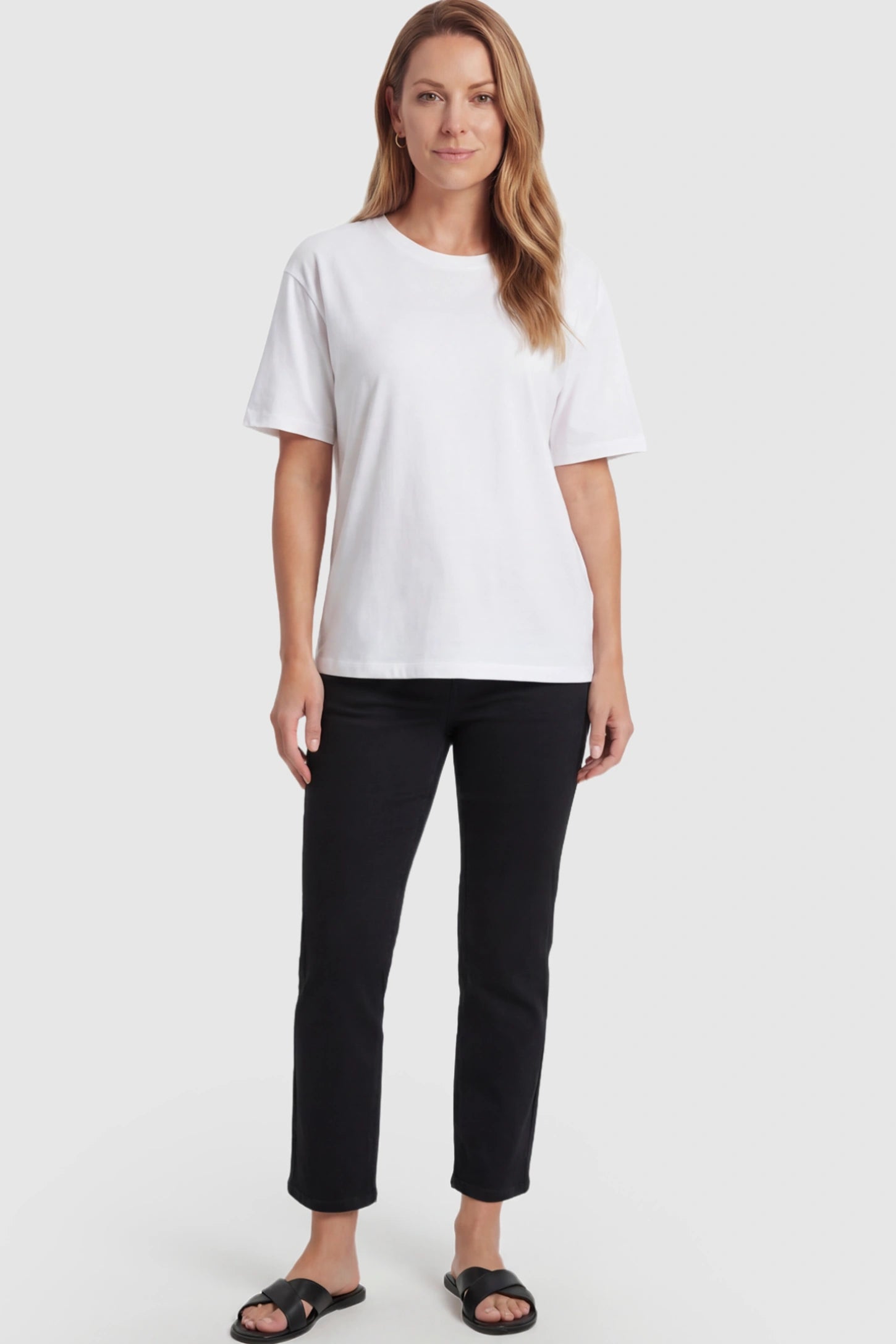 Elastic Full Panel Straight Leg Maternity Jeans Elastic Full Panel Straight Leg Maternity Jeans in Black featuring a high-stretch jersey waistband on a postpartum model.