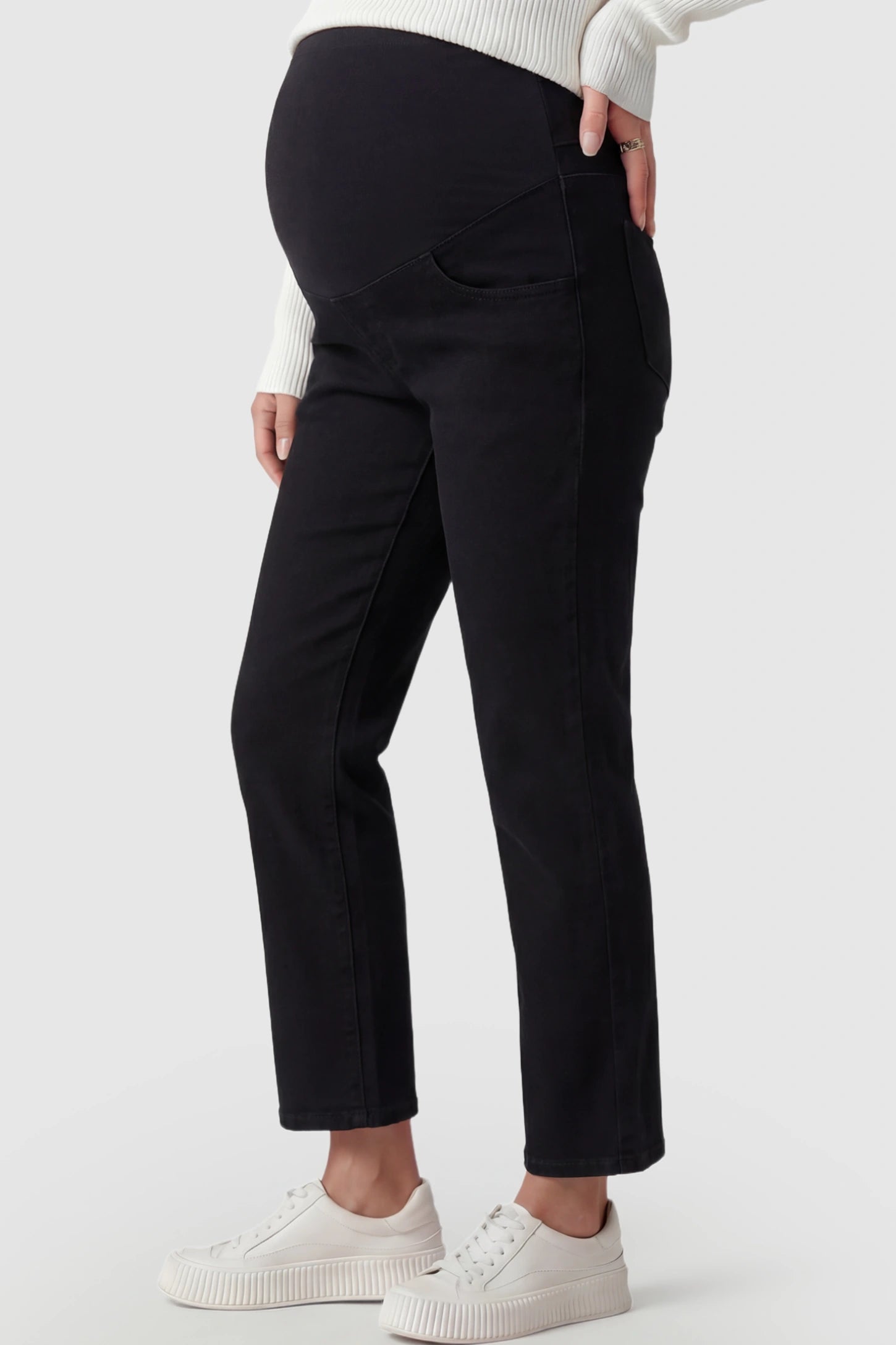 Elastic Full Panel Straight Leg Maternity Jeans Elastic Full Panel Straight Leg Maternity Jeans in Black featuring a high-stretch jersey waistband on a pregnant model.