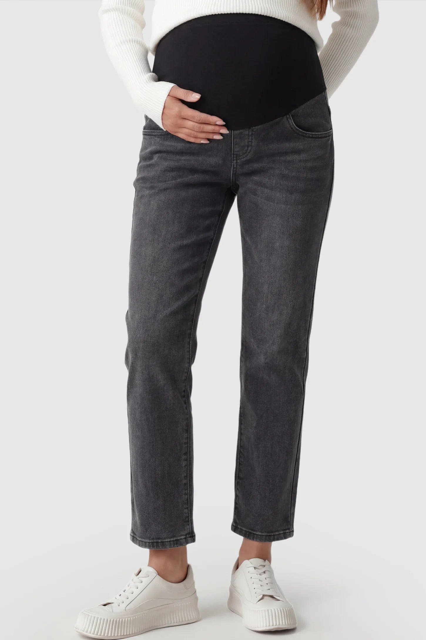 Elastic Full Panel Straight Leg Maternity Jeans Elastic Full Panel Straight Leg Maternity Jeans in smoky Gray featuring a high-stretch jersey waistband on a pregnant model.