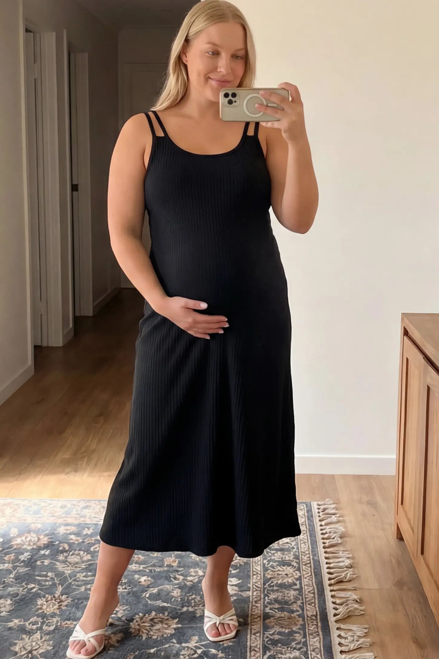 Double-Strap Sleeveless Maternity Slip Dress Double-Strap Sleeveless Maternity Slip Dress in black ribbed knit fabric on a pregnant model.