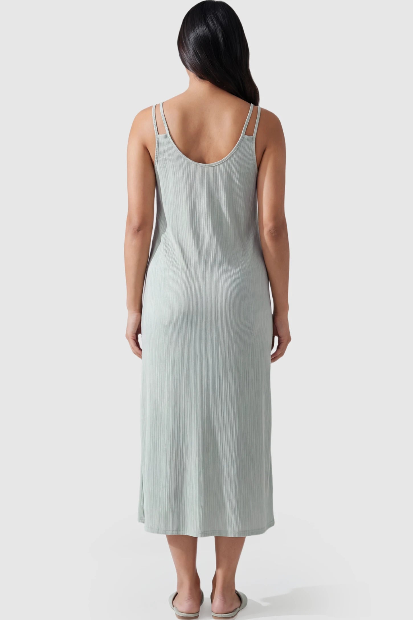 Double-Strap Sleeveless Maternity Slip Dress Double-Strap Sleeveless Maternity Slip Dress in Light Green ribbed knit fabric on a pregnant model.