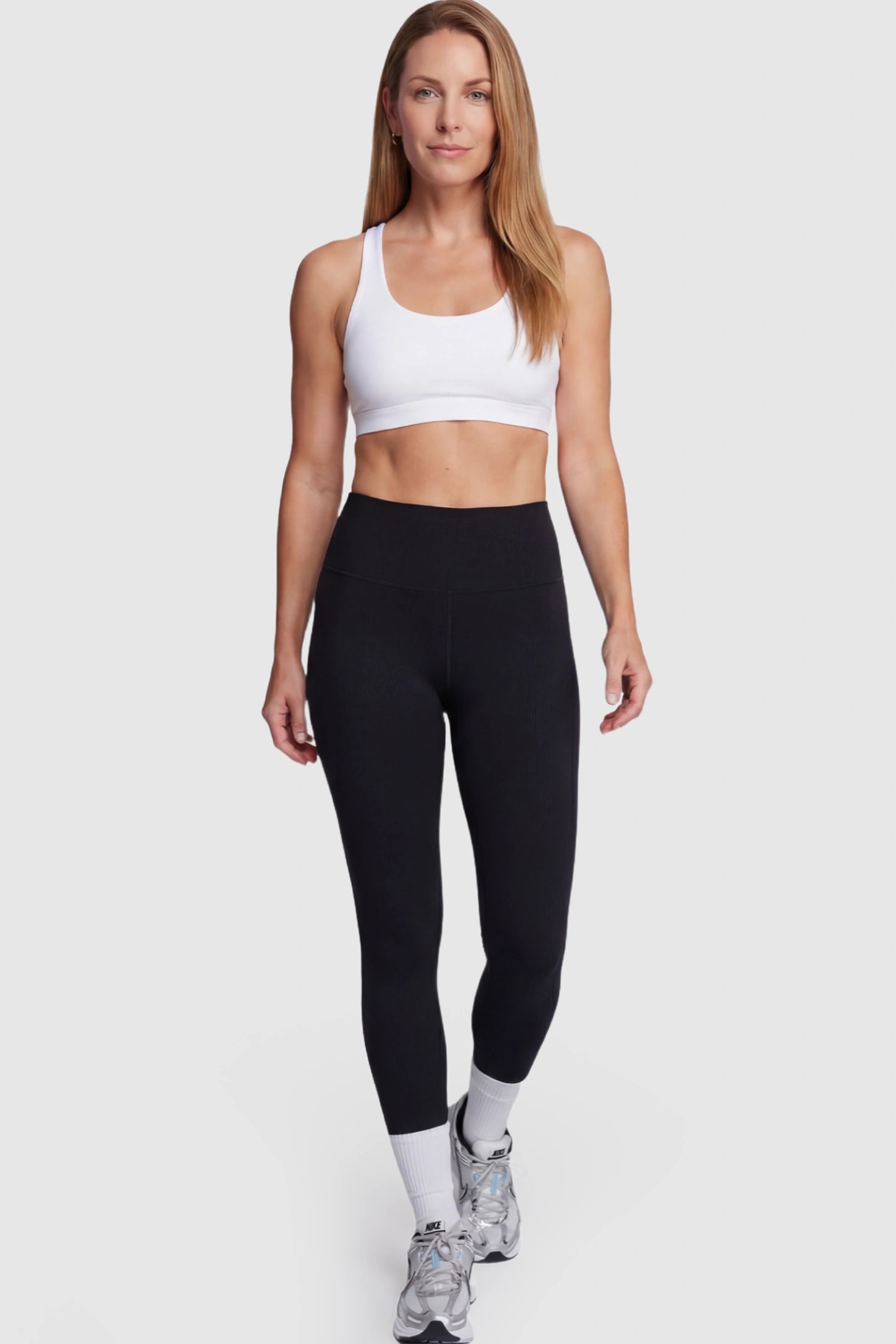 High Waist Slim Fit Maternity Leggings High Waist Slim Fit Maternity Leggings in Black featuring a seamless full-panel on a postpartum model.