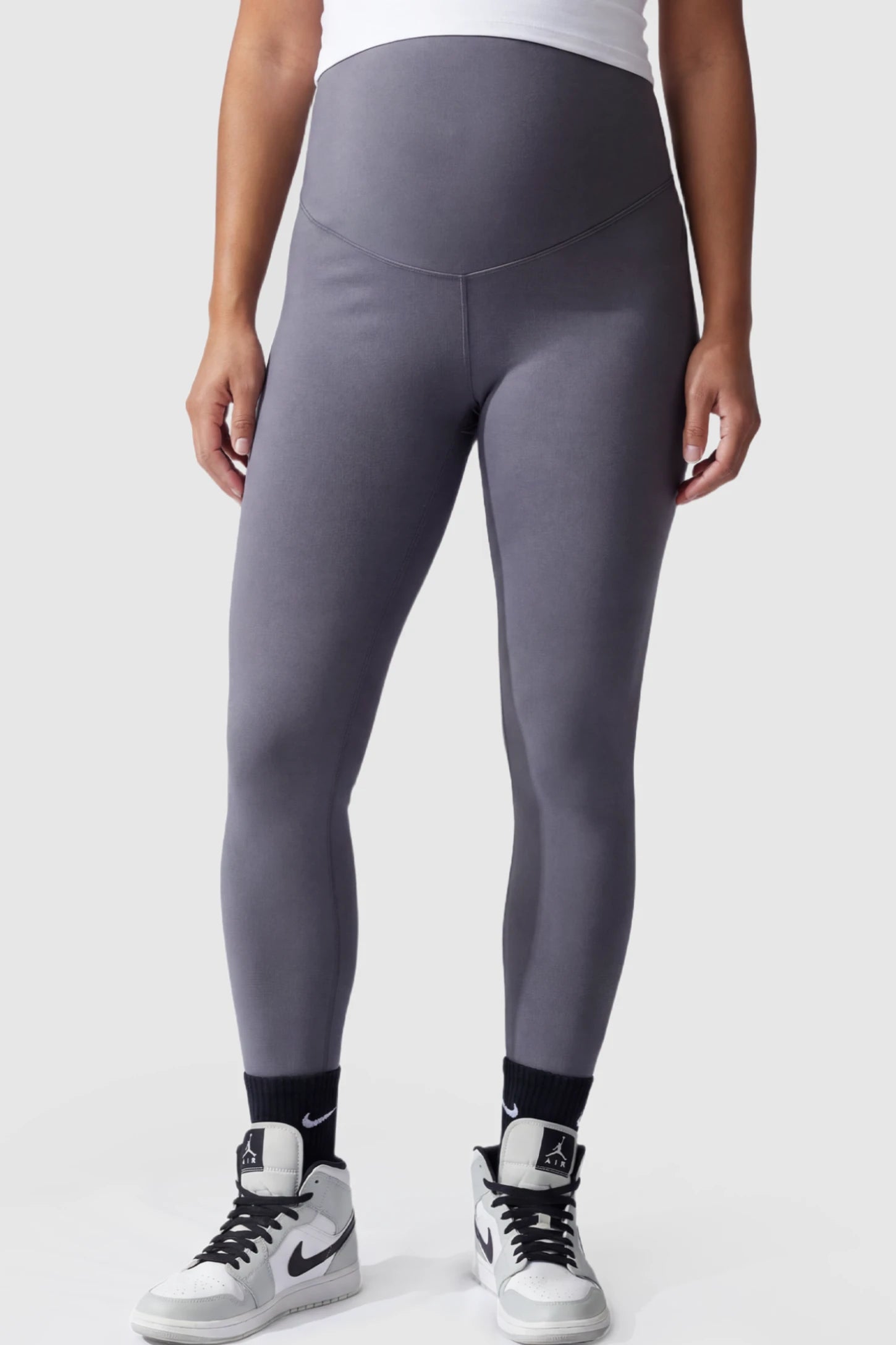 High Waist Slim Fit Maternity Leggings High Waist Slim Fit Maternity Leggings in Gray featuring a seamless full-panel on a pregnant model.