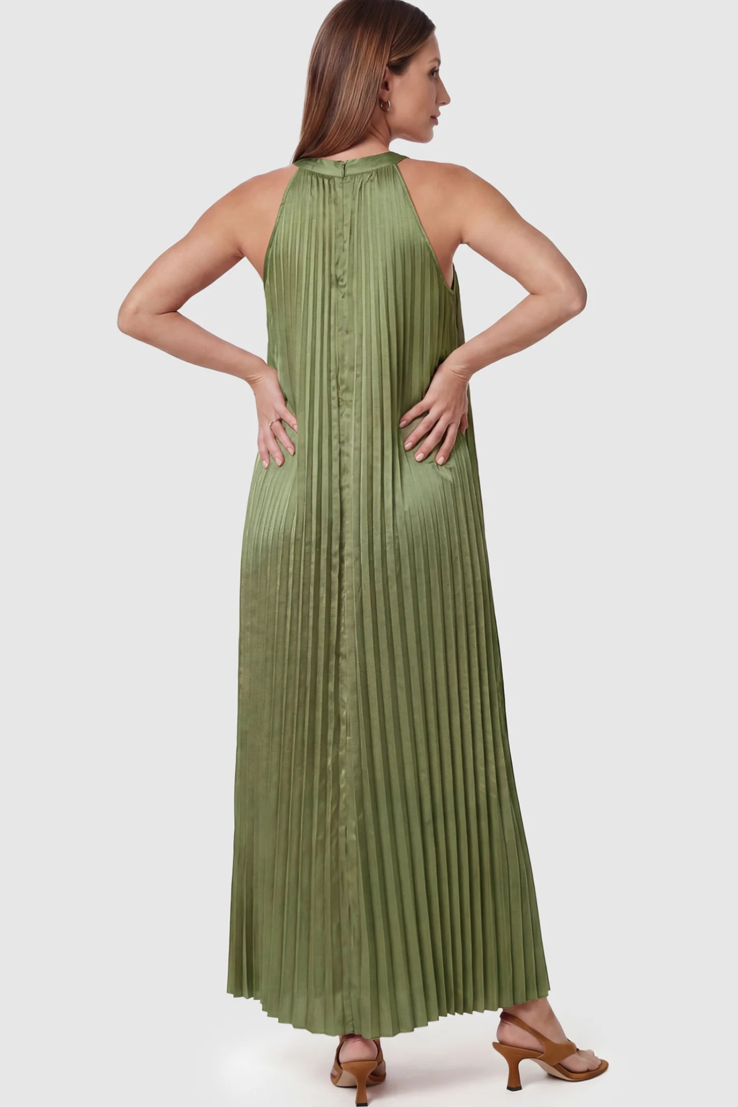 Pleated Faux Silk Halter Maternity Maxi Dress Pleated Faux Silk Halter Maternity Maxi Dress in Green featuring micro-pleat texture on a pregnant model showing back view.