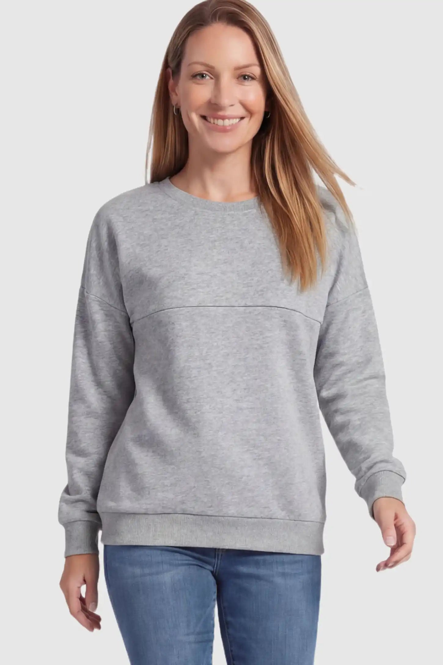 Solid Long Sleeve Pullover Maternity & Nursing Sweatshirt Solid Long Sleeve Pullover Maternity & Nursing Sweatshirt in Light Gray featuring a hidden zip raised seam on a model.