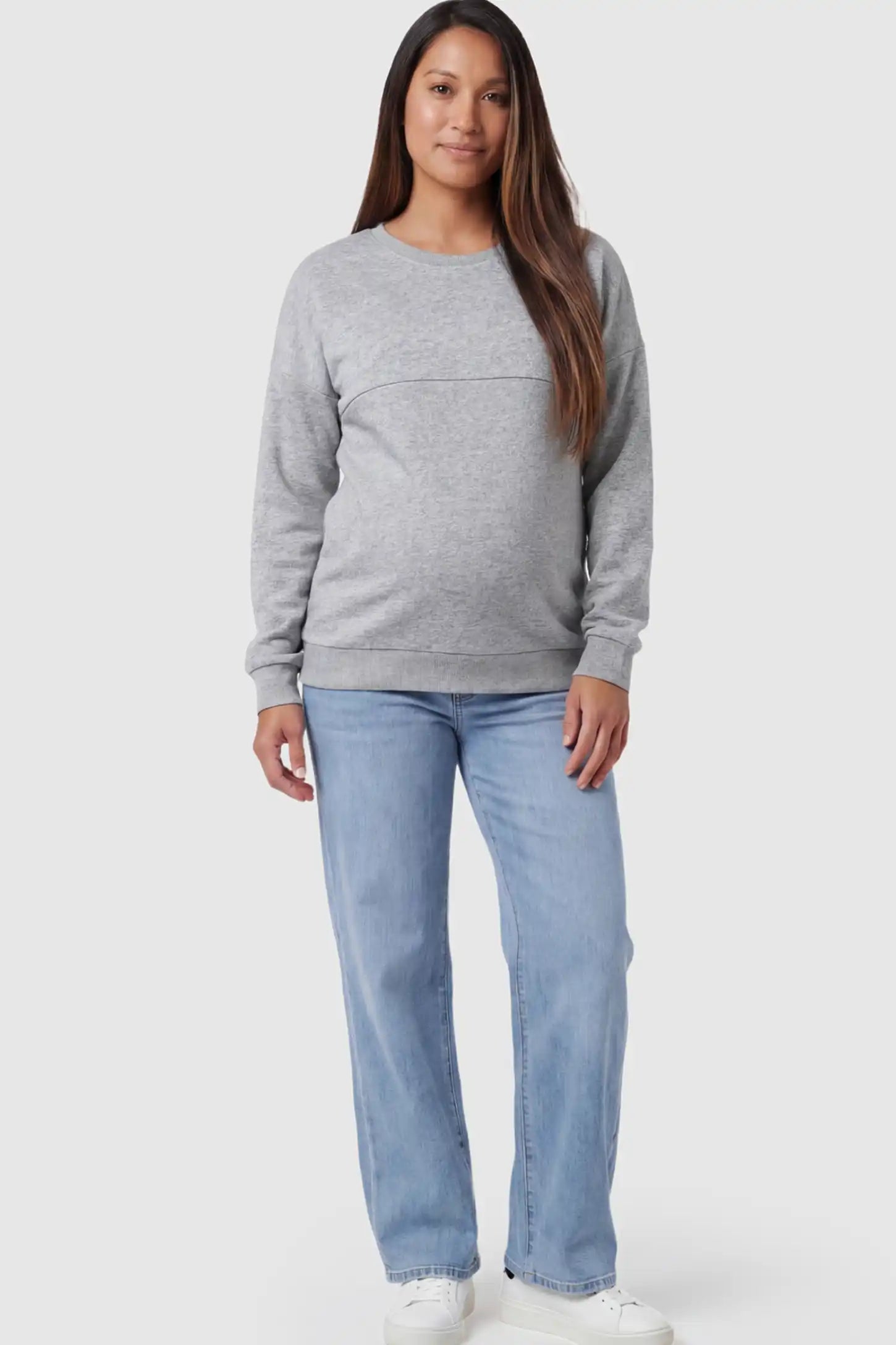 Solid Long Sleeve Pullover Maternity & Nursing Sweatshirt Solid Long Sleeve Pullover Maternity & Nursing Sweatshirt in Light Gray featuring a hidden zip raised seam on a model.