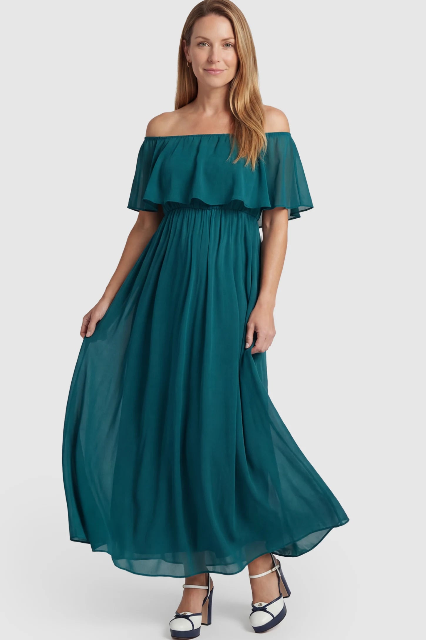 Chiffon Off Shoulder Maternity Maxi Dress Chiffon Off-Shoulder Maternity Maxi Dress in green featuring a Floor-length on a postpartum model.
