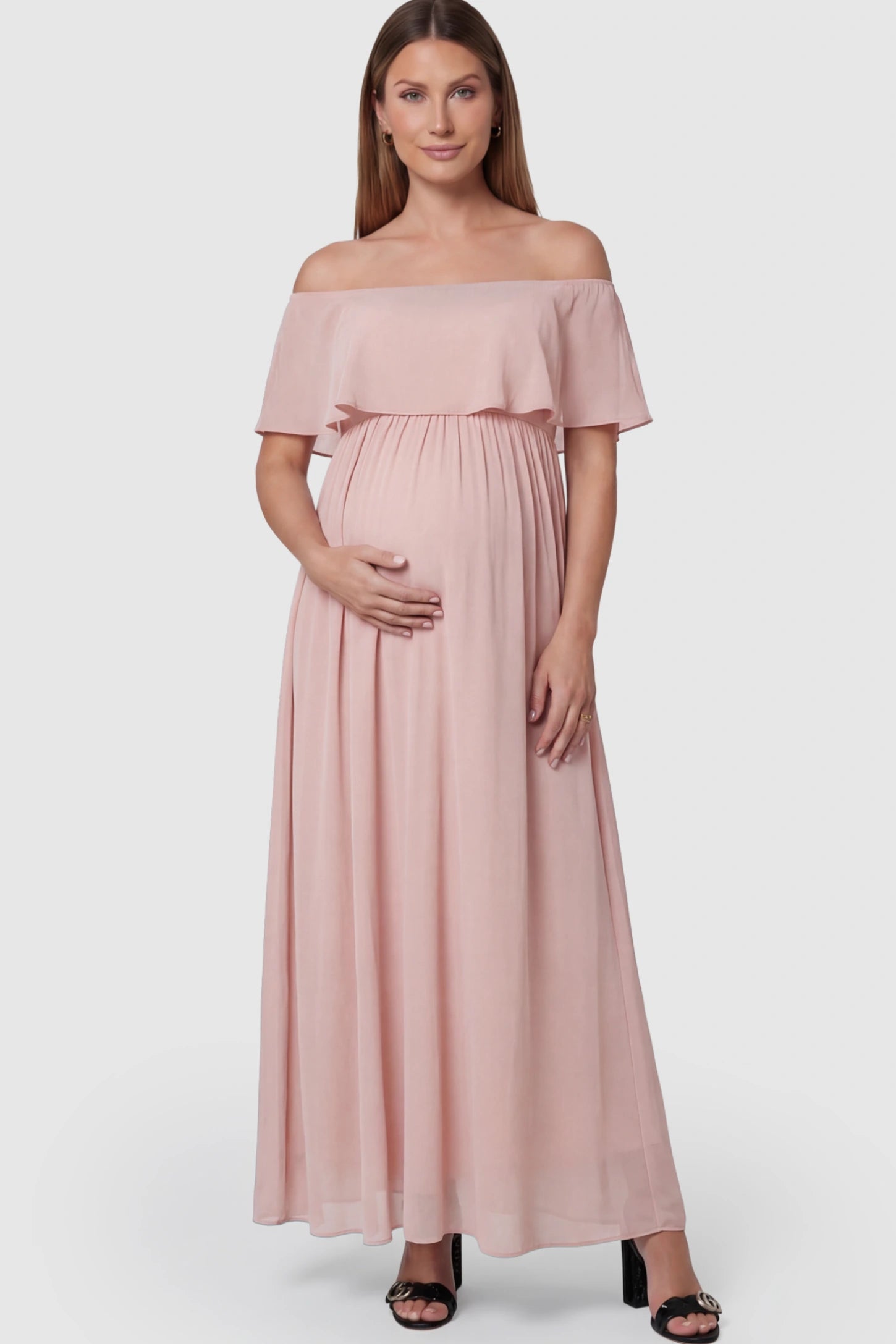 Chiffon Off-Shoulder Maternity Maxi Dress in Pink featuring a Floor-length on a pregnant model.