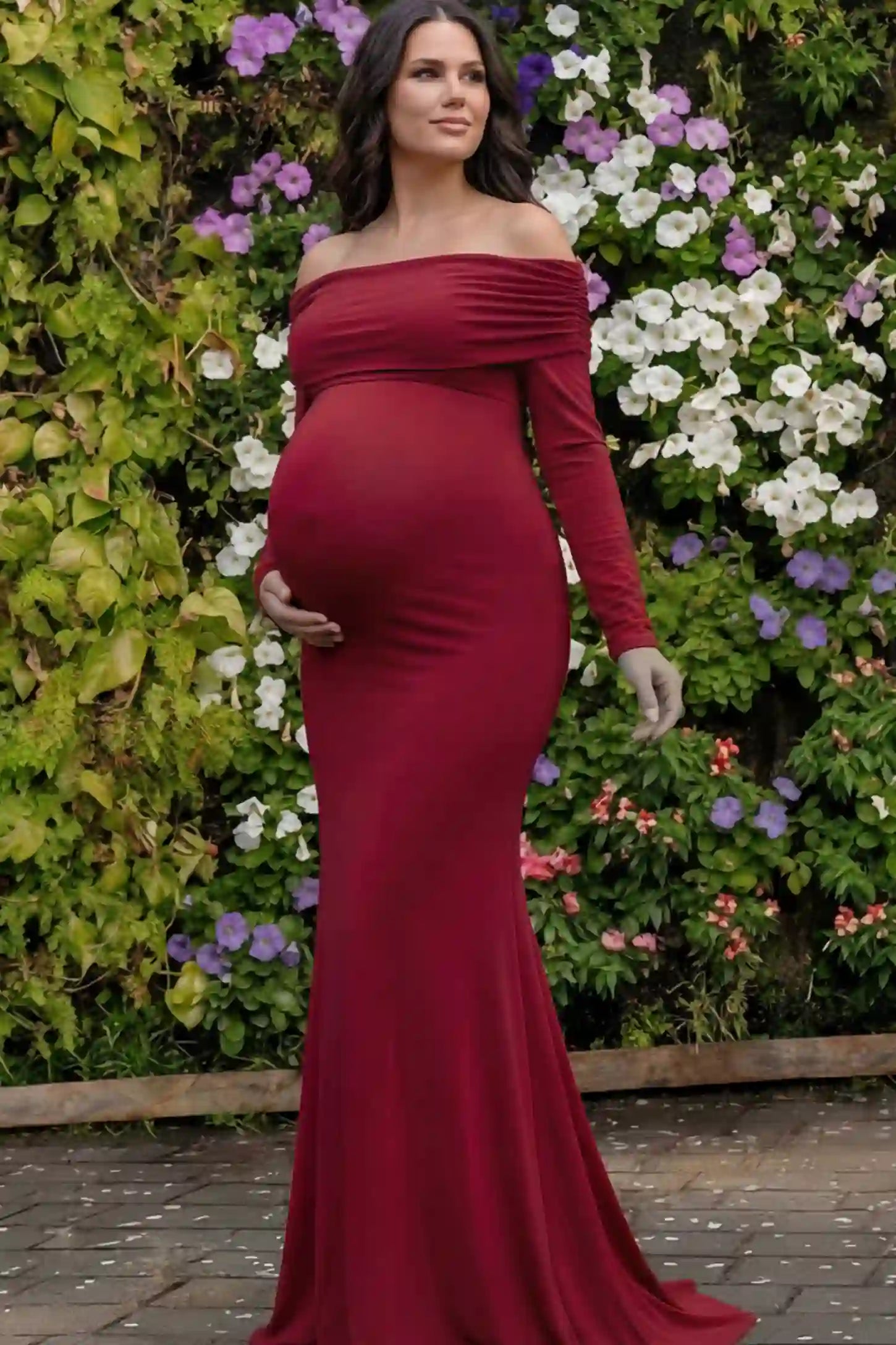 Solid Off Shoulder Bodycon Maternity Maxi Dress Off Shoulder Bodycon Maternity Maxi Dress in Red featuring a smooth stretch finish on a pregnant model.