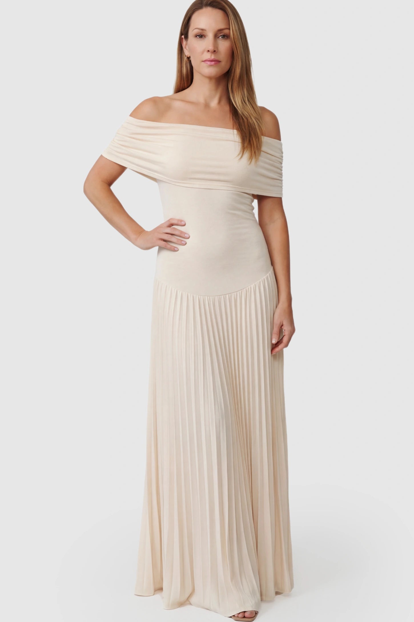 Pleated Off Shoulder Maternity Maxi Dress Pleated Off Shoulder Maternity Maxi Dress in Beige featuring a floor-length silhouette on a postpartum model.