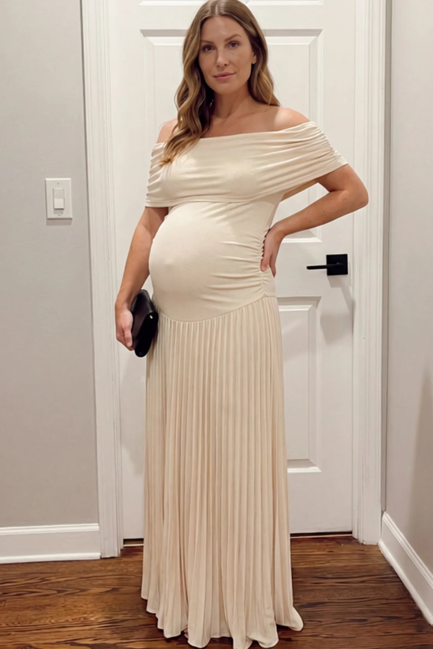 Pleated Off Shoulder Maternity Maxi Dress Pleated Off Shoulder Maternity Maxi Dress in Beige featuring a floor-length silhouette on a pregnant model.