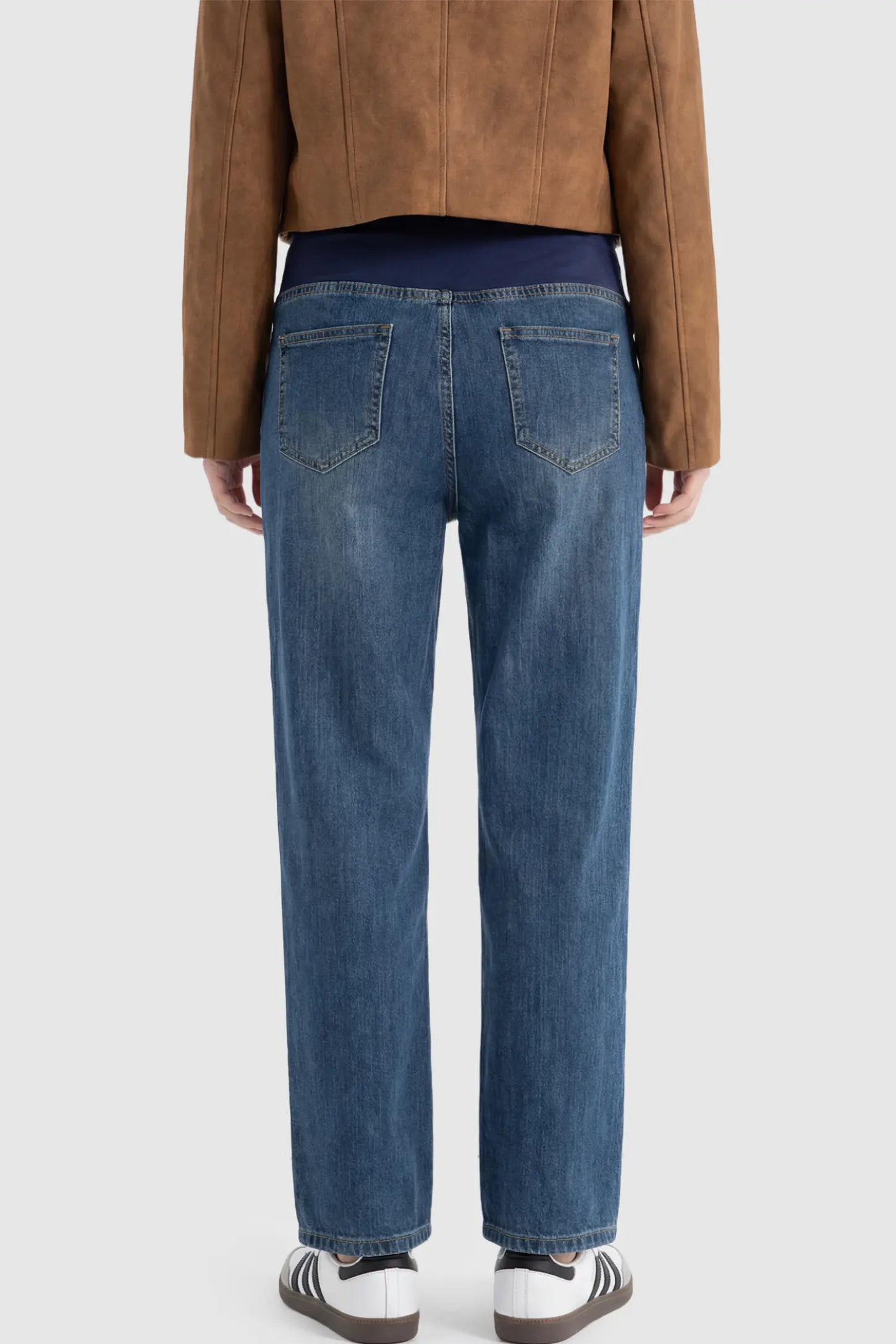 Full Panel Stretch Waistband Straight Leg Maternity Jeans Full Panel Straight Leg Maternity Jeans in Blue featuring a stretch waistband on a pregnant model showing back.