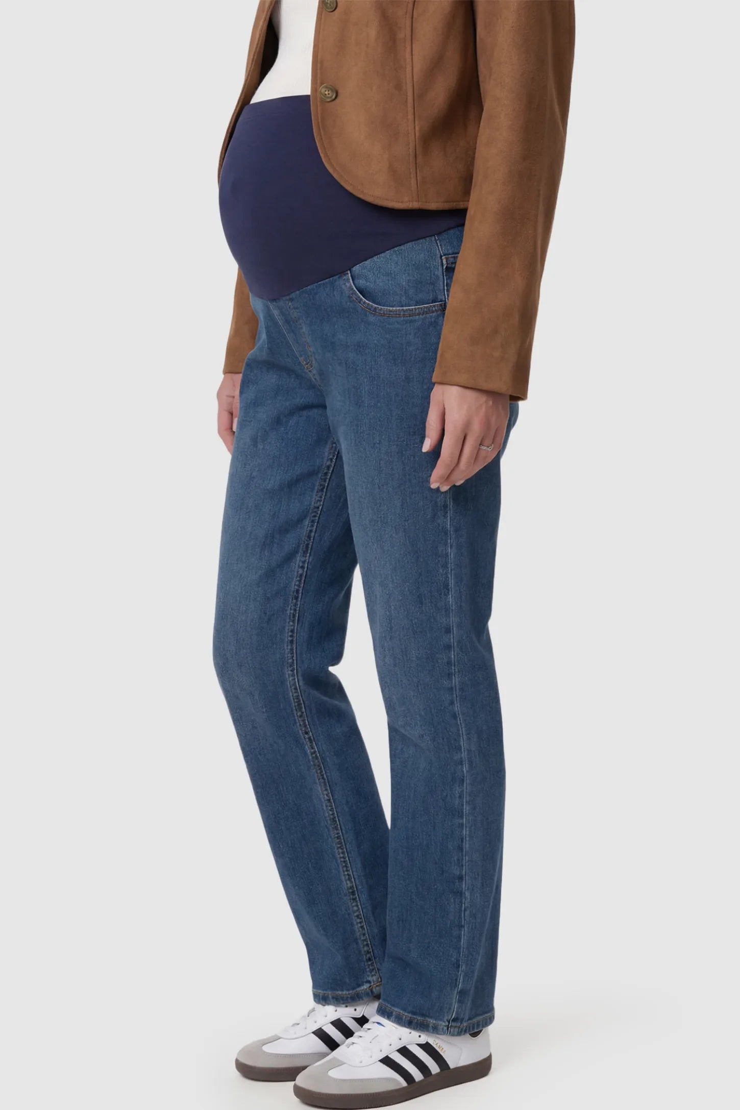 Full Panel Stretch Waistband Straight Leg Maternity Jeans Full Panel Straight Leg Maternity Jeans in Blue featuring a stretch waistband on a pregnant model showing side.