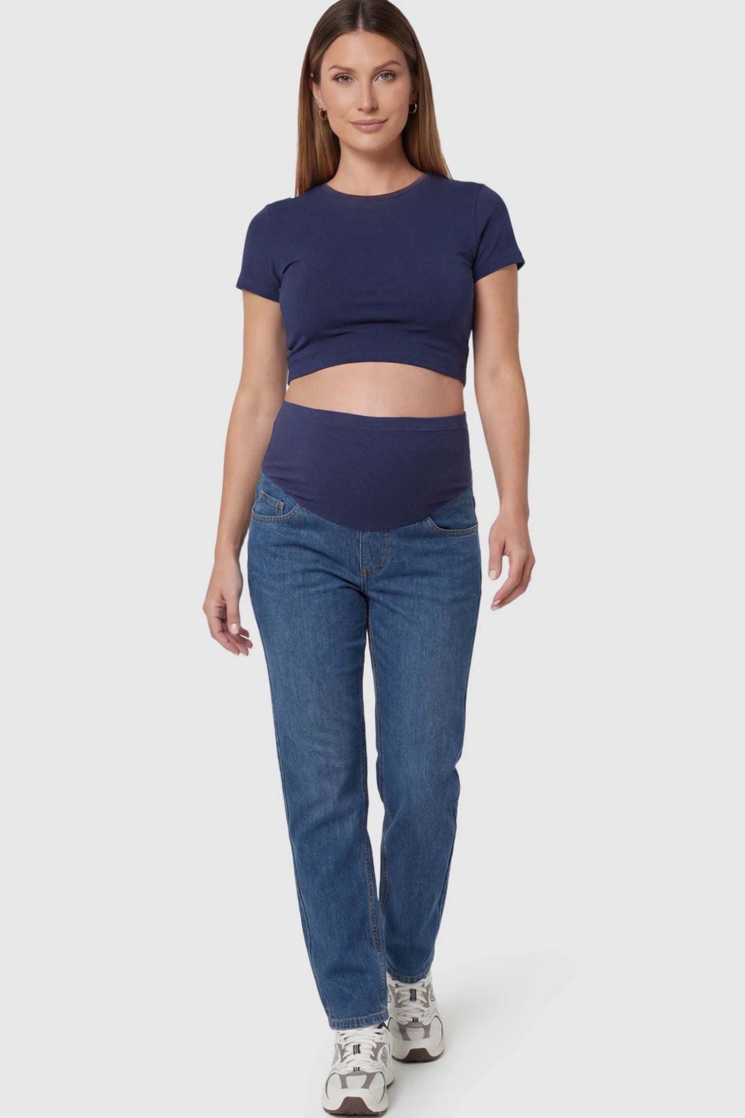 Full Panel Straight Leg Maternity Jeans in Blue featuring a stretch waistband on a pregnant model facing front.